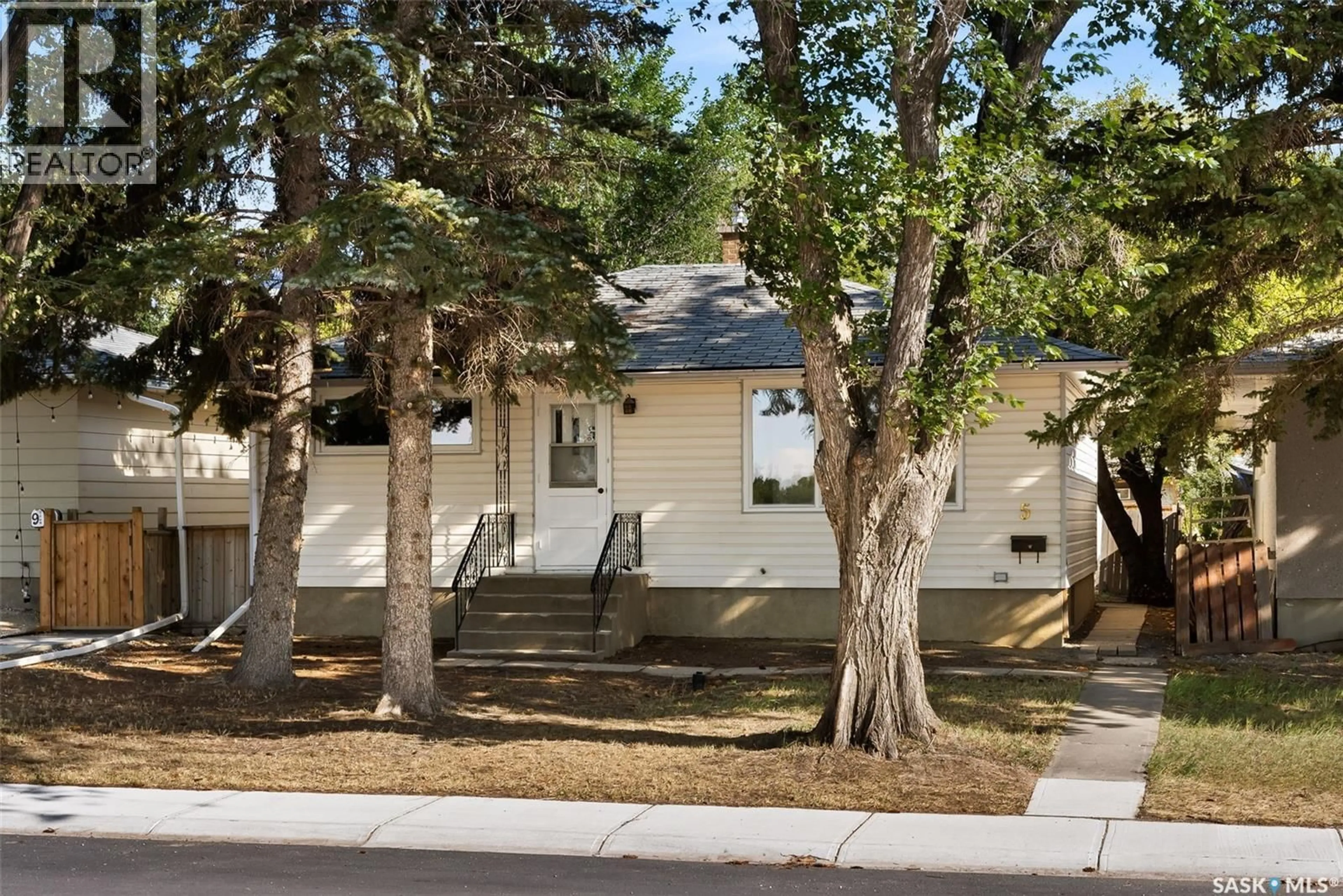 Home with vinyl exterior material, street for 5 DIXON CRESCENT, Regina Saskatchewan S4N1V3