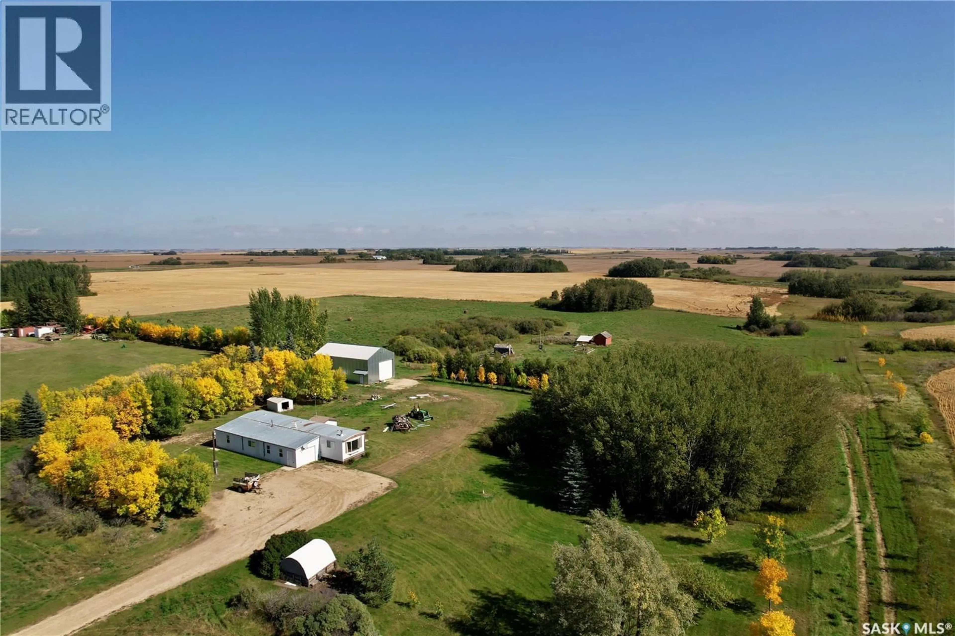 A pic from outside/outdoor area/front of a property/back of a property/a pic from drone, mountain view for WARKENTIN ACREAGE, Blucher Rm No. 343 Saskatchewan S0K0Y0