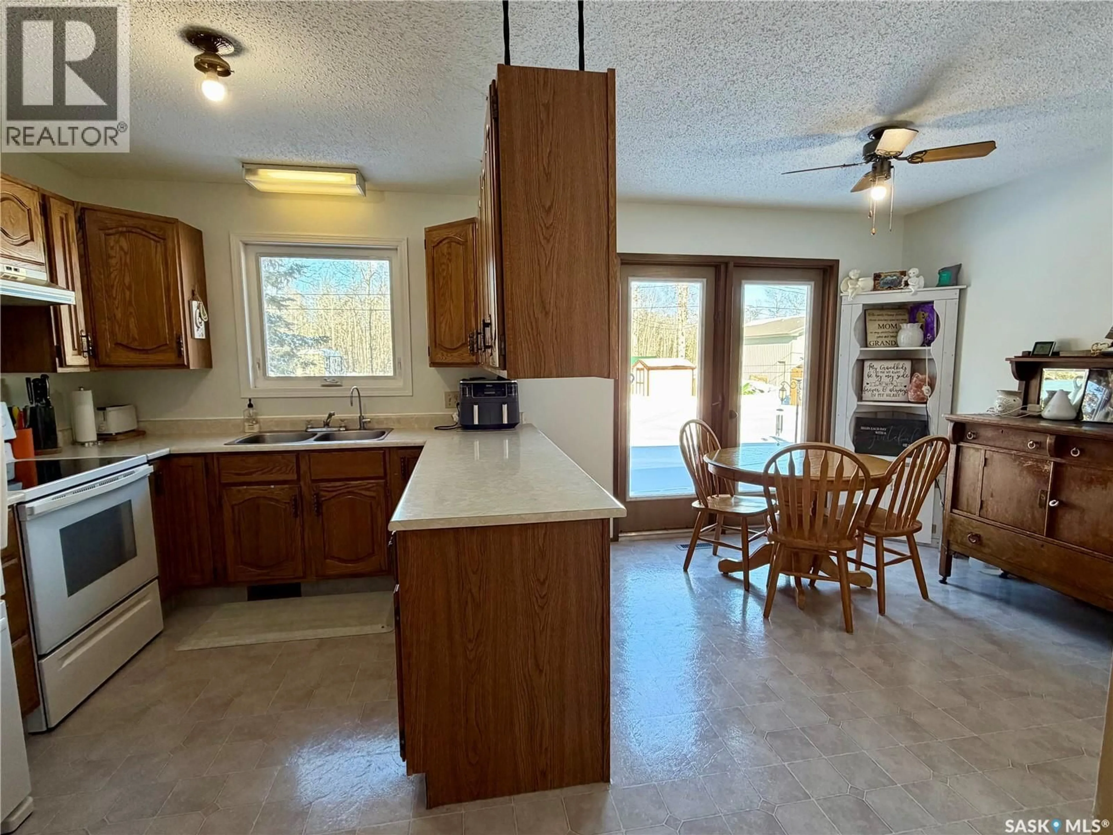 Open concept kitchen, ceramic/tile floor for 111 GRAHAM PLACE, Medstead Saskatchewan S0M1W0