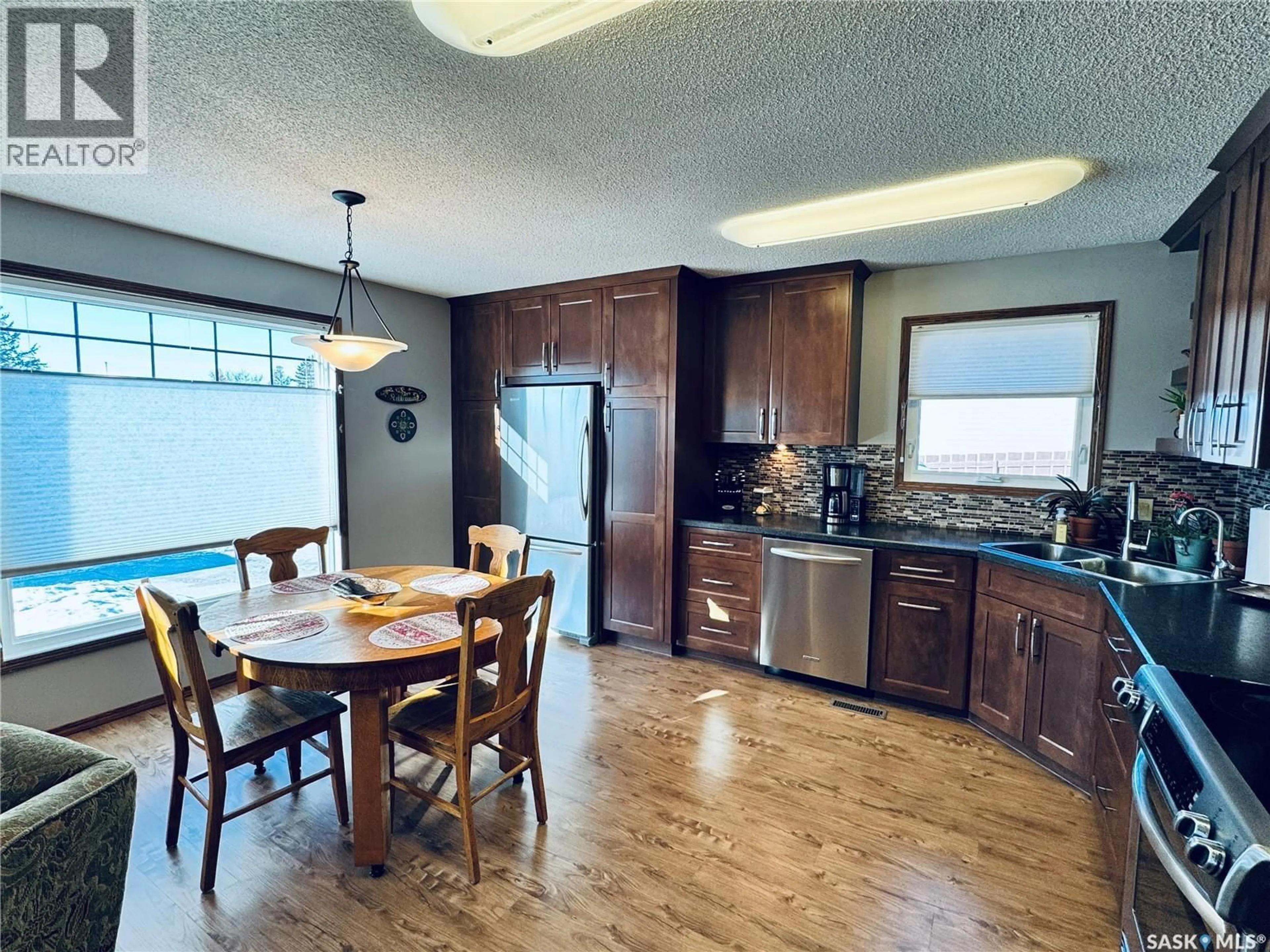 Open concept kitchen, unknown for 403 8TH AVENUE, Biggar Saskatchewan S0K0M0