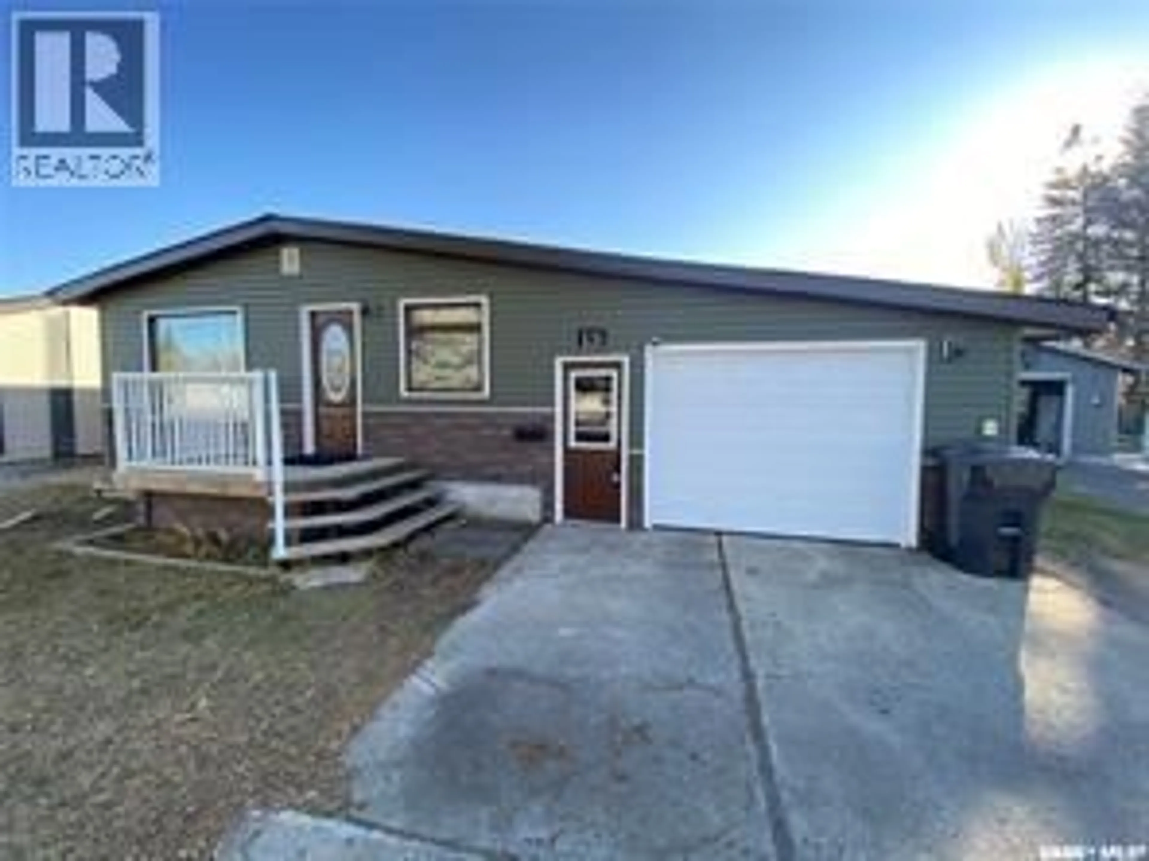 Home with vinyl exterior material, street for 15 REDWOOD DRIVE, Yorkton Saskatchewan S3N2N3