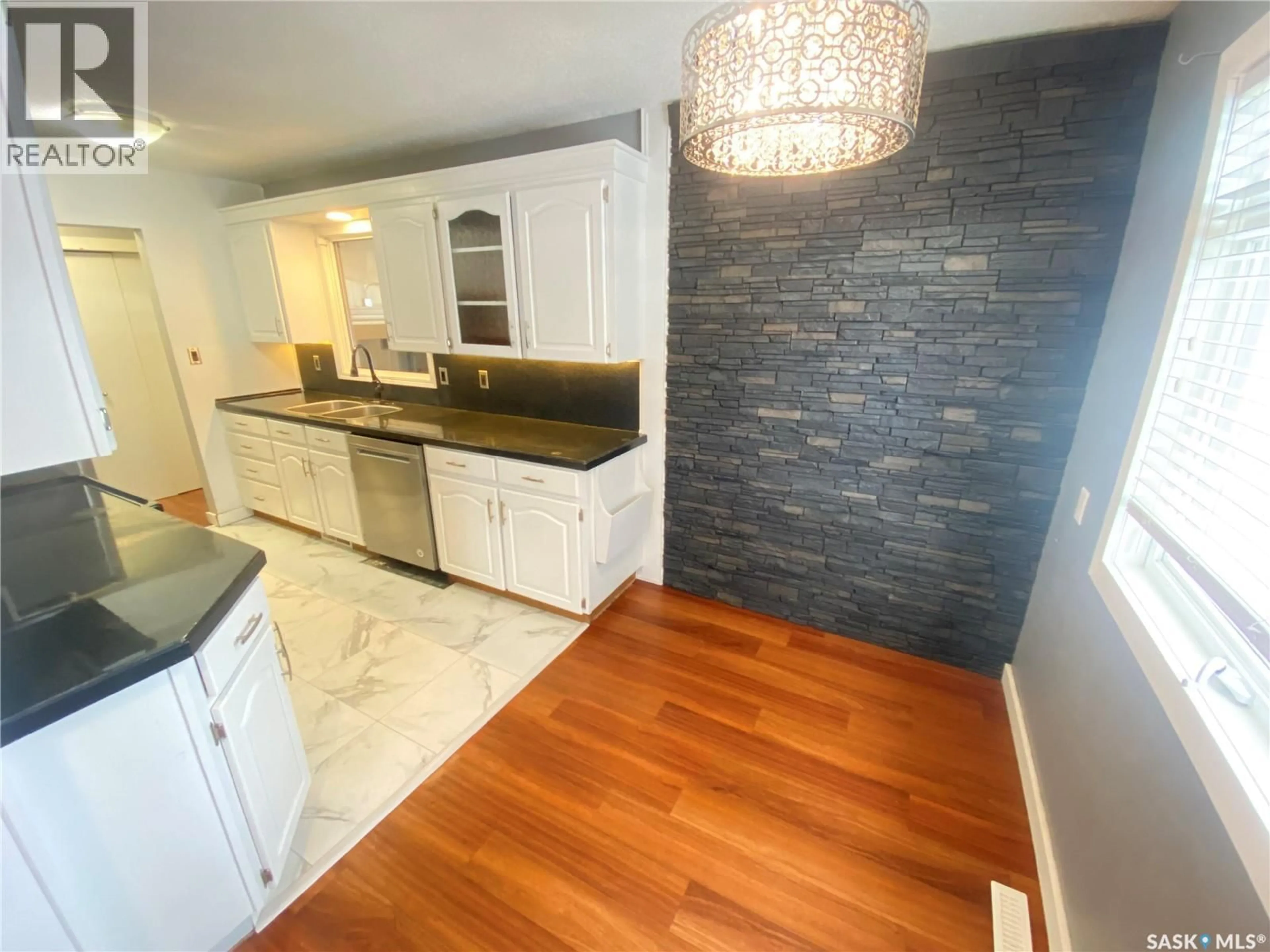 Open concept kitchen, ceramic/tile floor for 15 REDWOOD DRIVE, Yorkton Saskatchewan S3N2N3