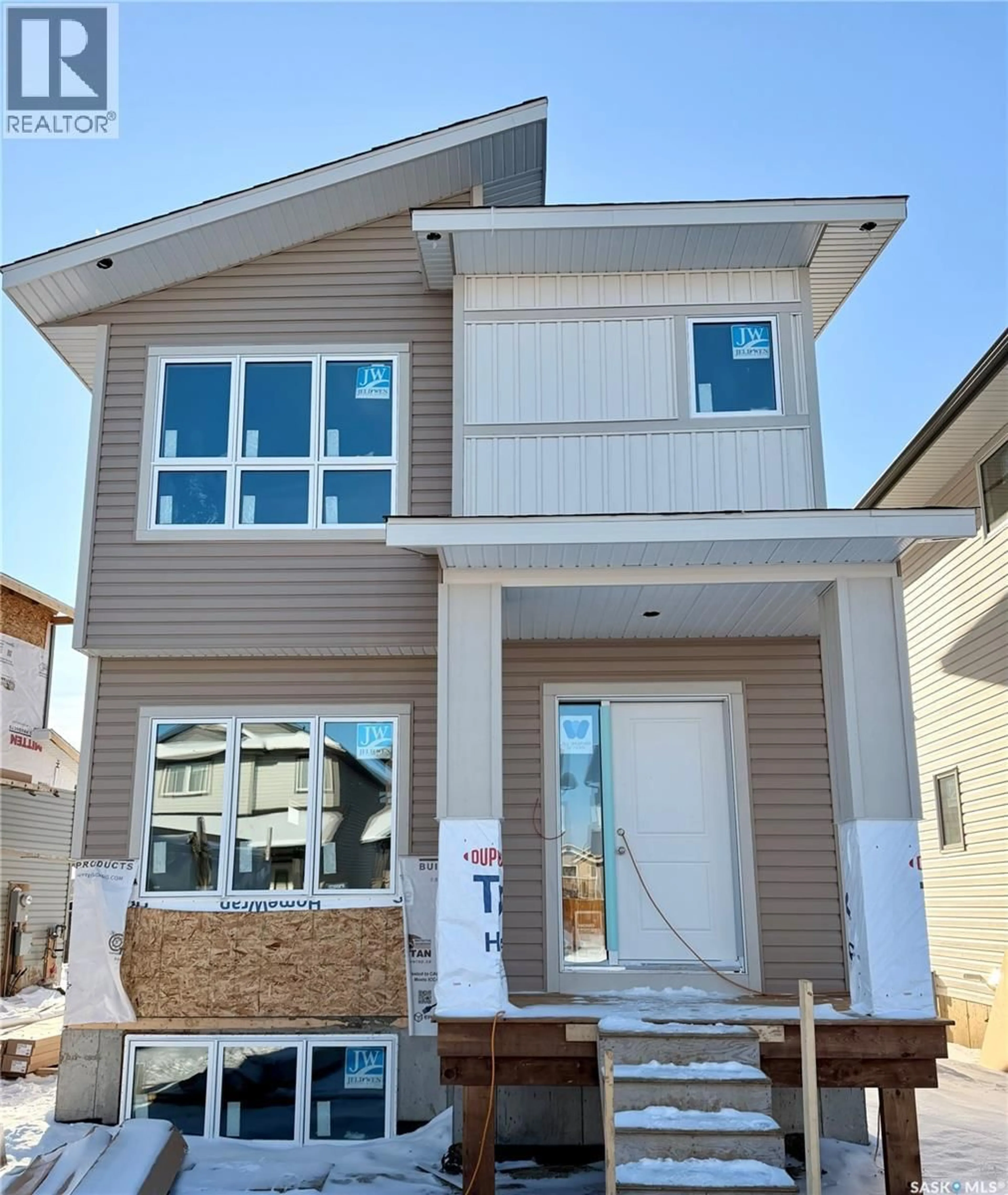 Home with vinyl exterior material, street for 1412 BESNARD DRIVE, Martensville Saskatchewan S0K2T1