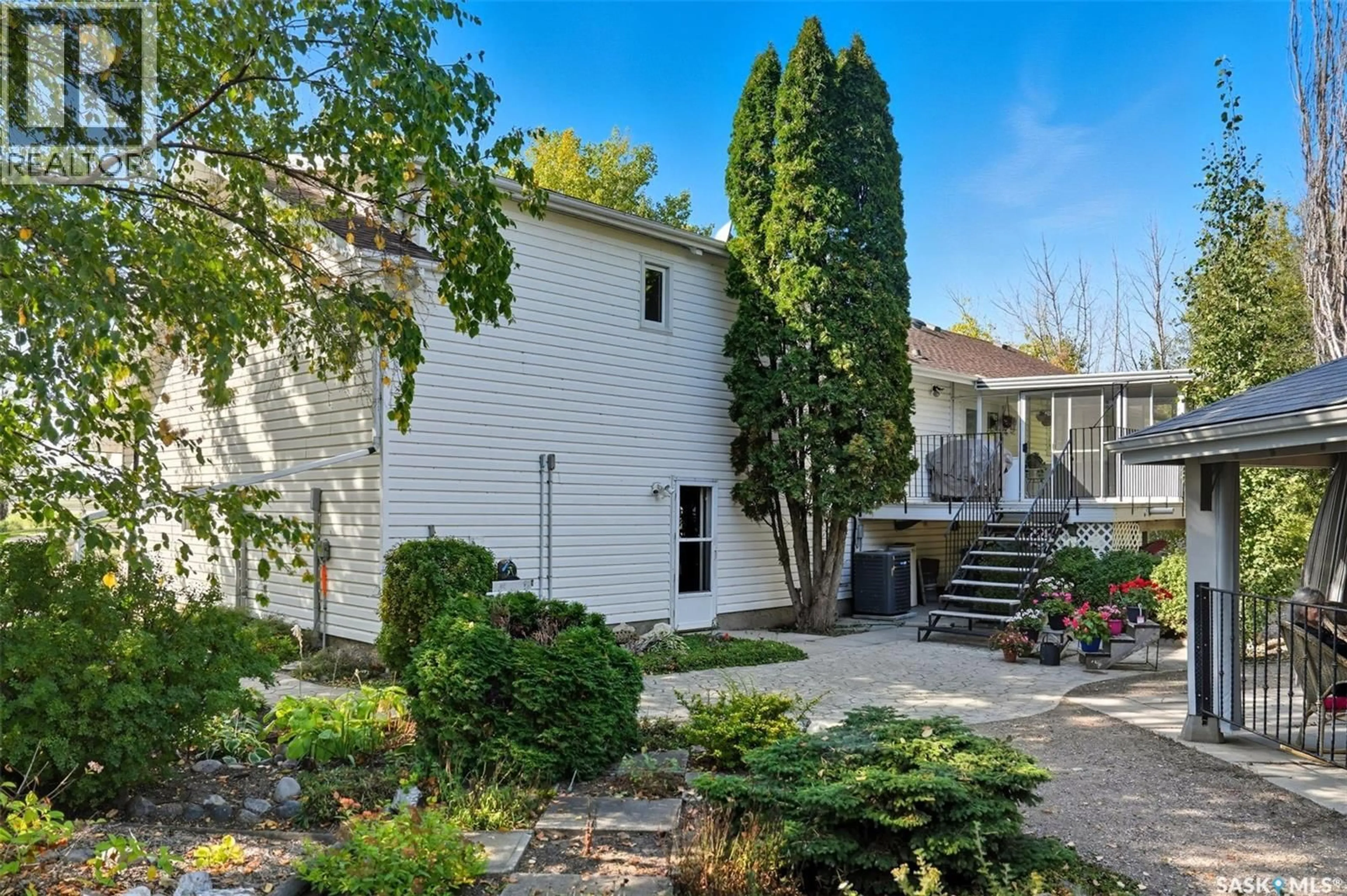 A pic from outside/outdoor area/front of a property/back of a property/a pic from drone, street for 475 DALMENY ROAD, Corman Park Rm No. 344 Saskatchewan S7H0T6