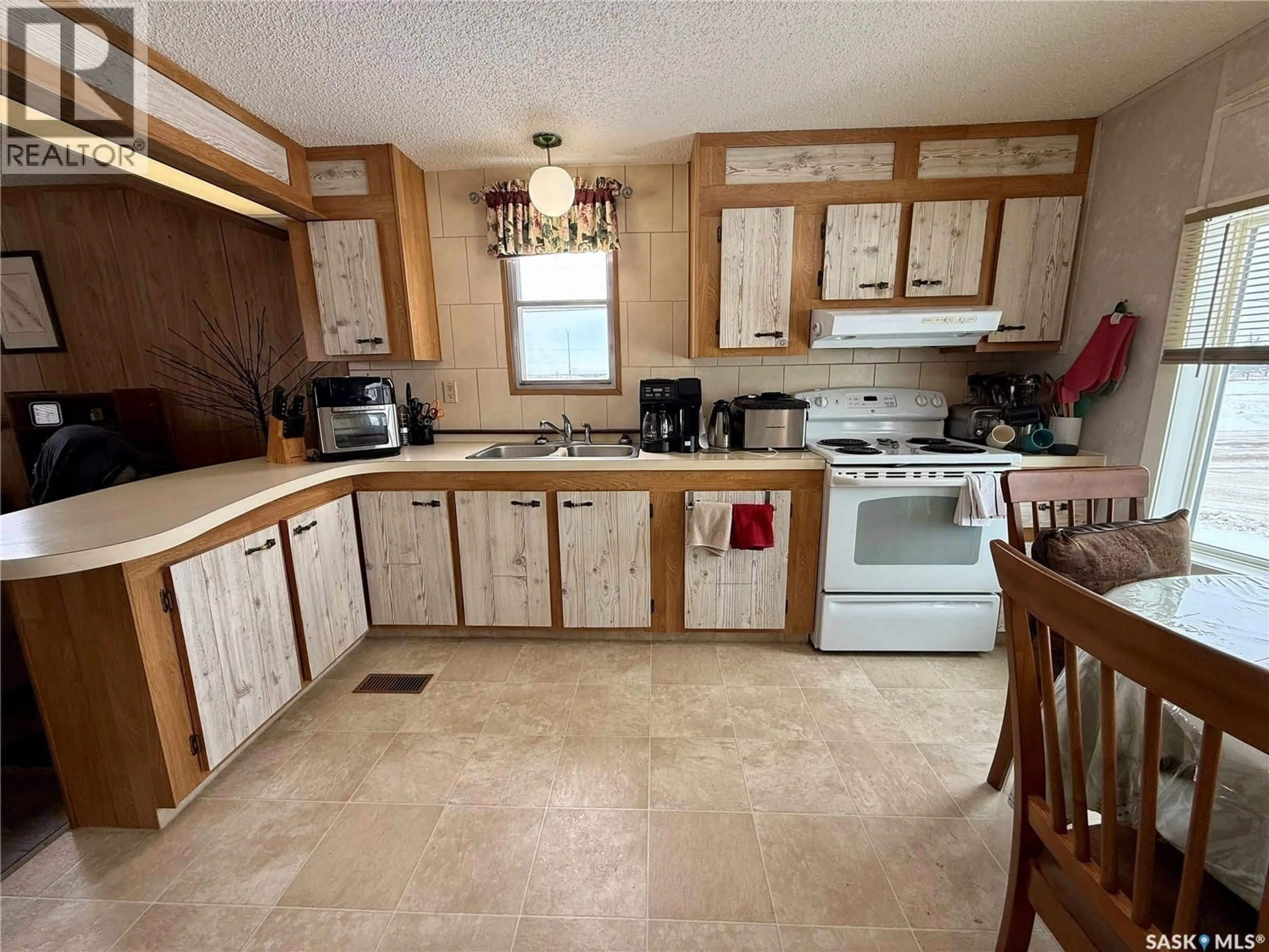 Standard kitchen, ceramic/tile floor for 491 33RD STREET, Battleford Saskatchewan S0M0E0