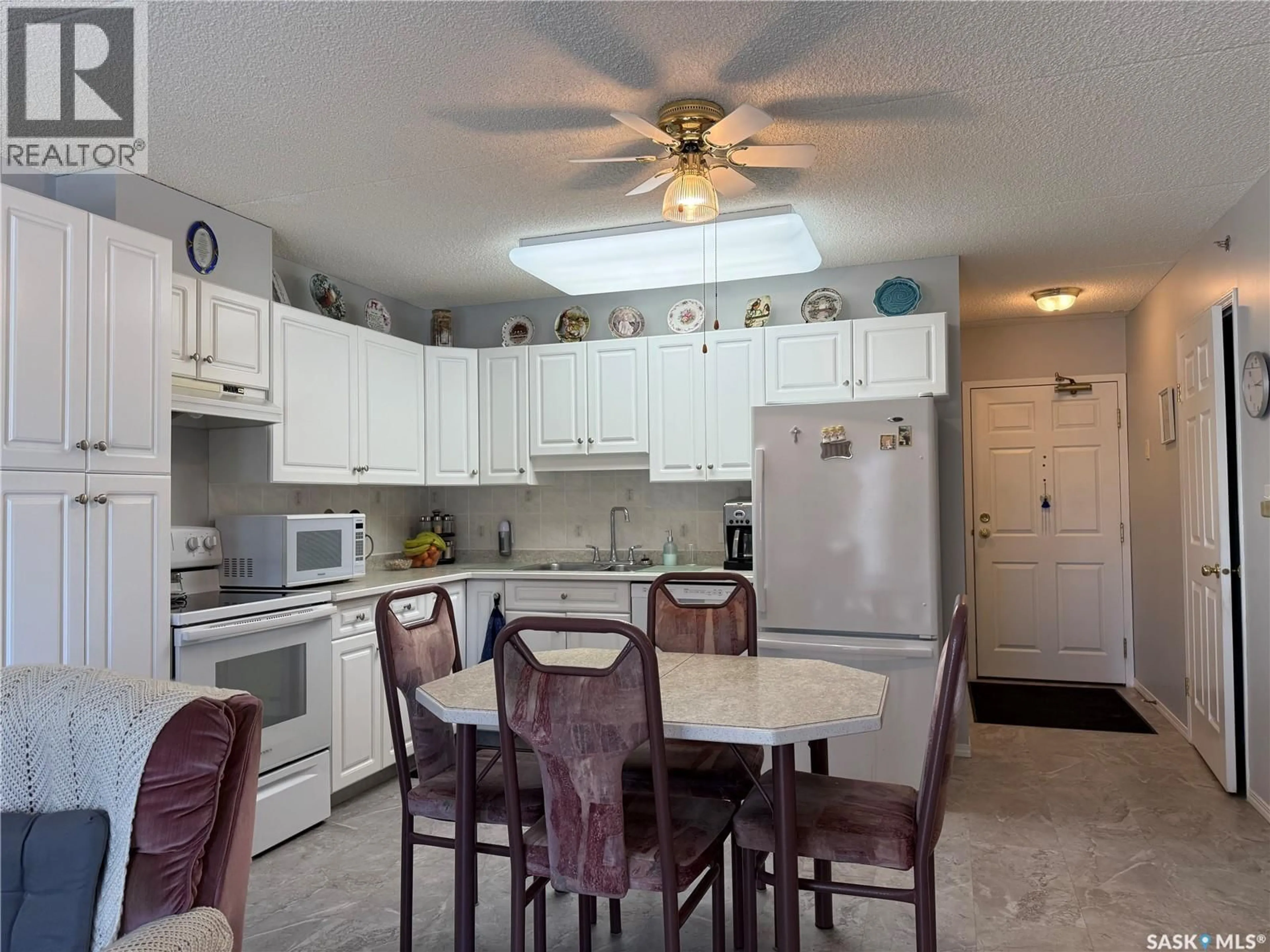 Open concept kitchen, ceramic/tile floor for 302 740 9TH STREET, Humboldt Saskatchewan S0K2A0