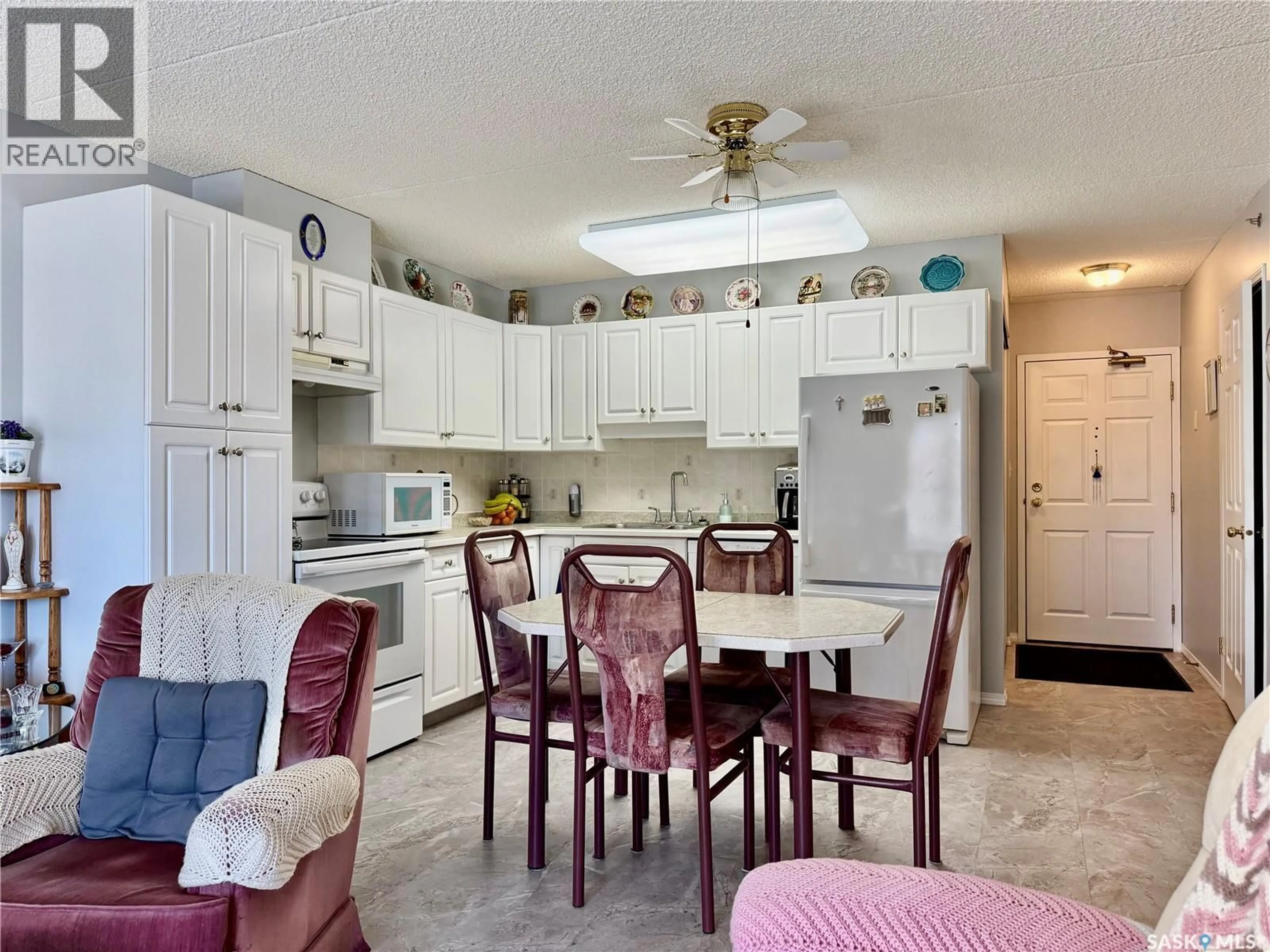 Open concept kitchen, ceramic/tile floor for 302 740 9TH STREET, Humboldt Saskatchewan S0K2A0