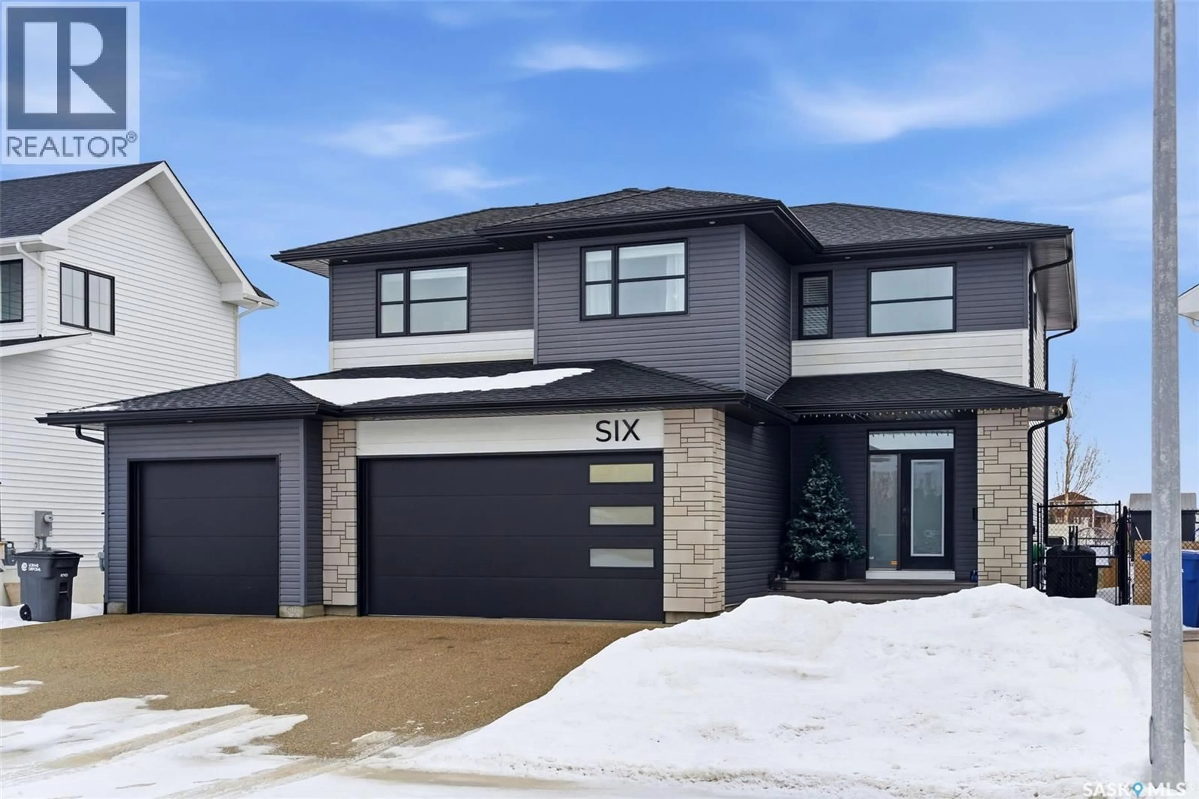 Home with brick exterior material, street for 6 BUTTE BAY, Pilot Butte Saskatchewan S0G3Z0