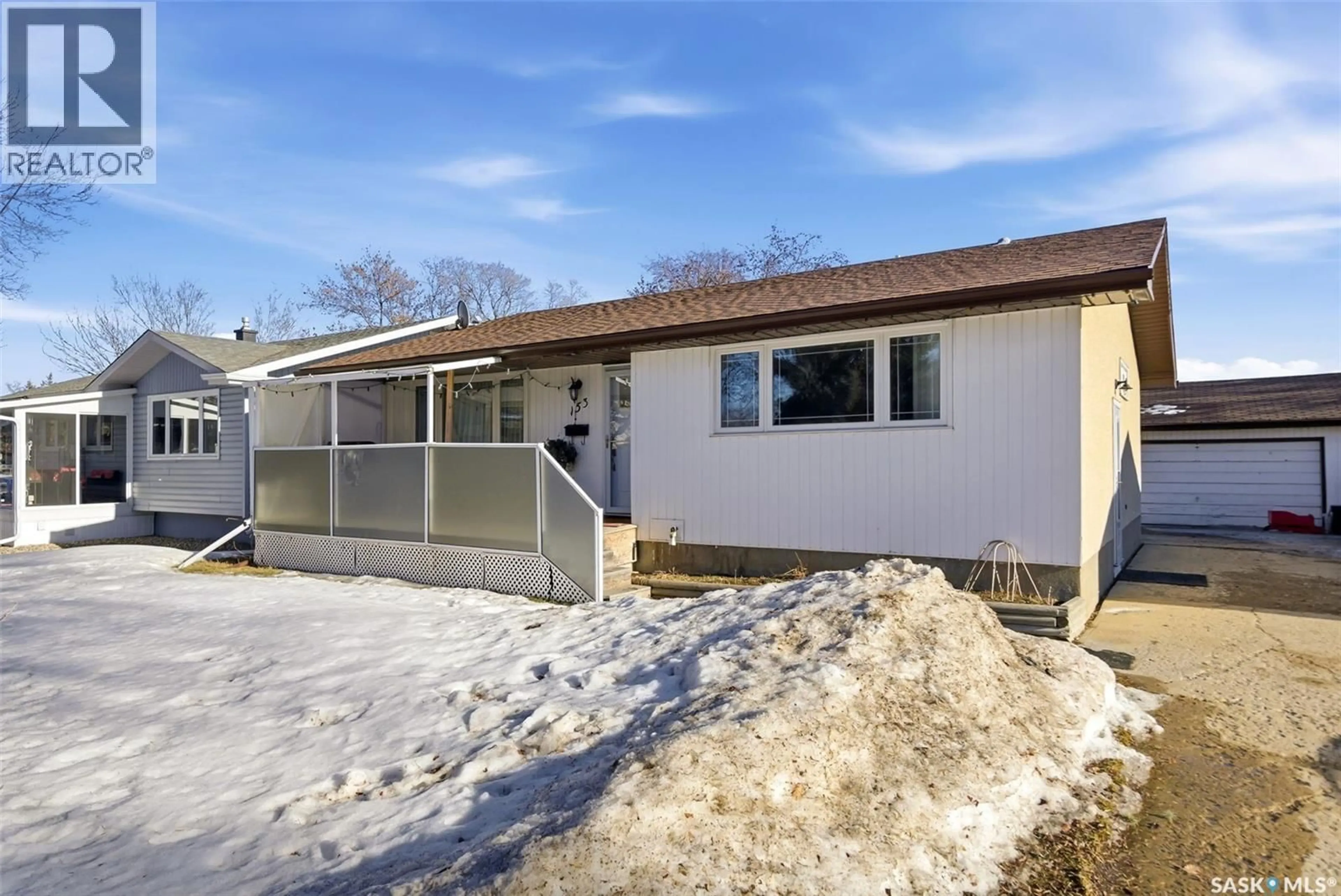 Home with vinyl exterior material, street for 153 MCDOUGALL CRESCENT, Regina Saskatchewan S4S5M6