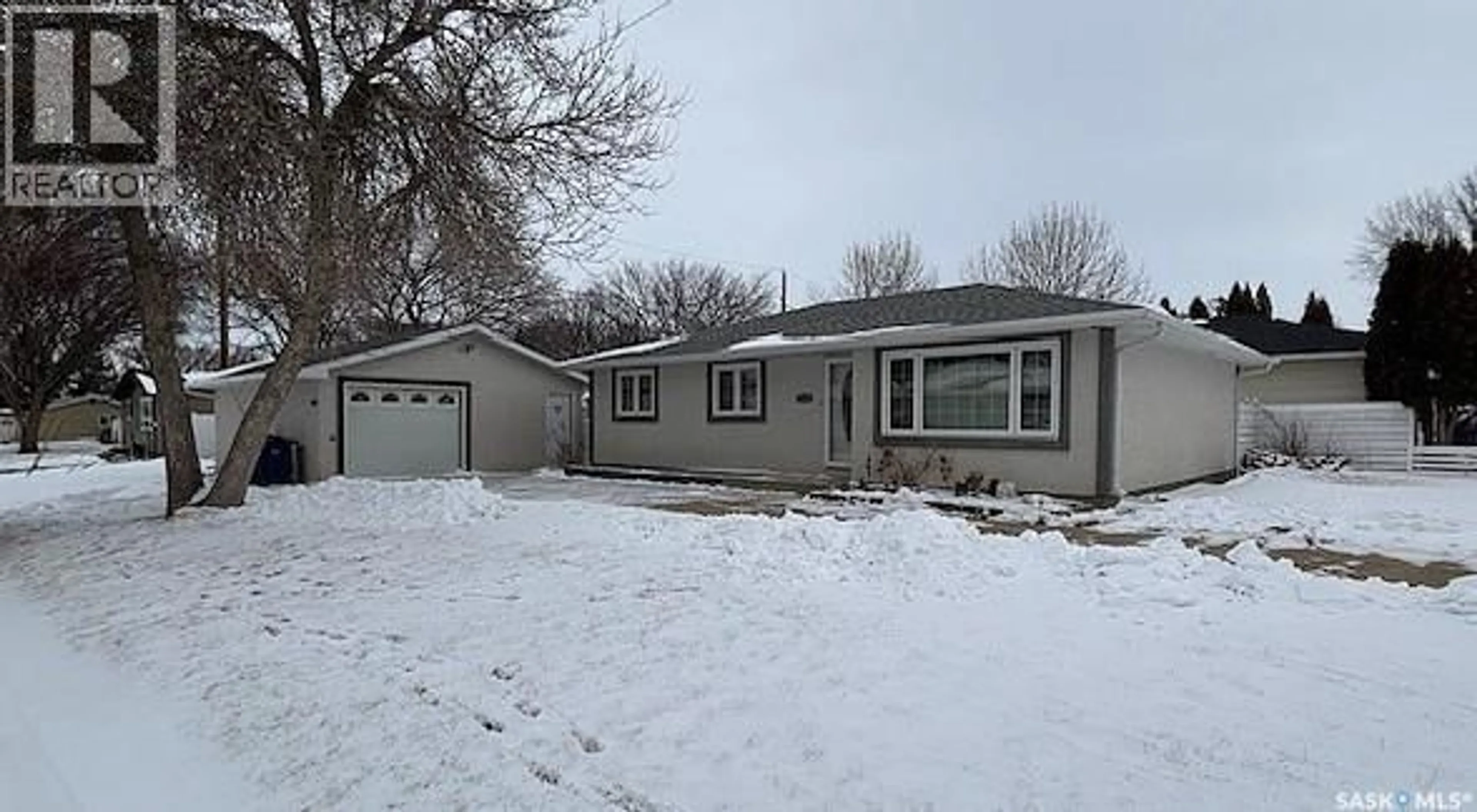 Home with vinyl exterior material, street for 1169 CURRIE CRESCENT, Moose Jaw Saskatchewan S6H6B6
