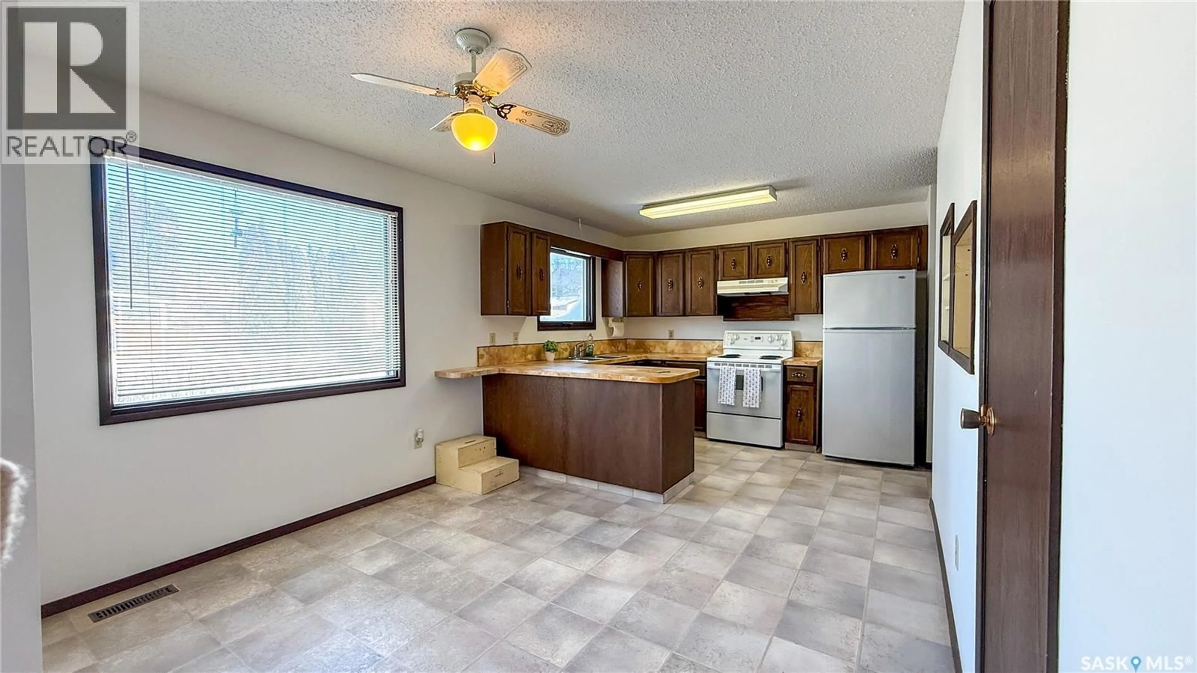 Standard kitchen, ceramic/tile floor for 1292 96TH STREET, North Battleford Saskatchewan S9A0H1