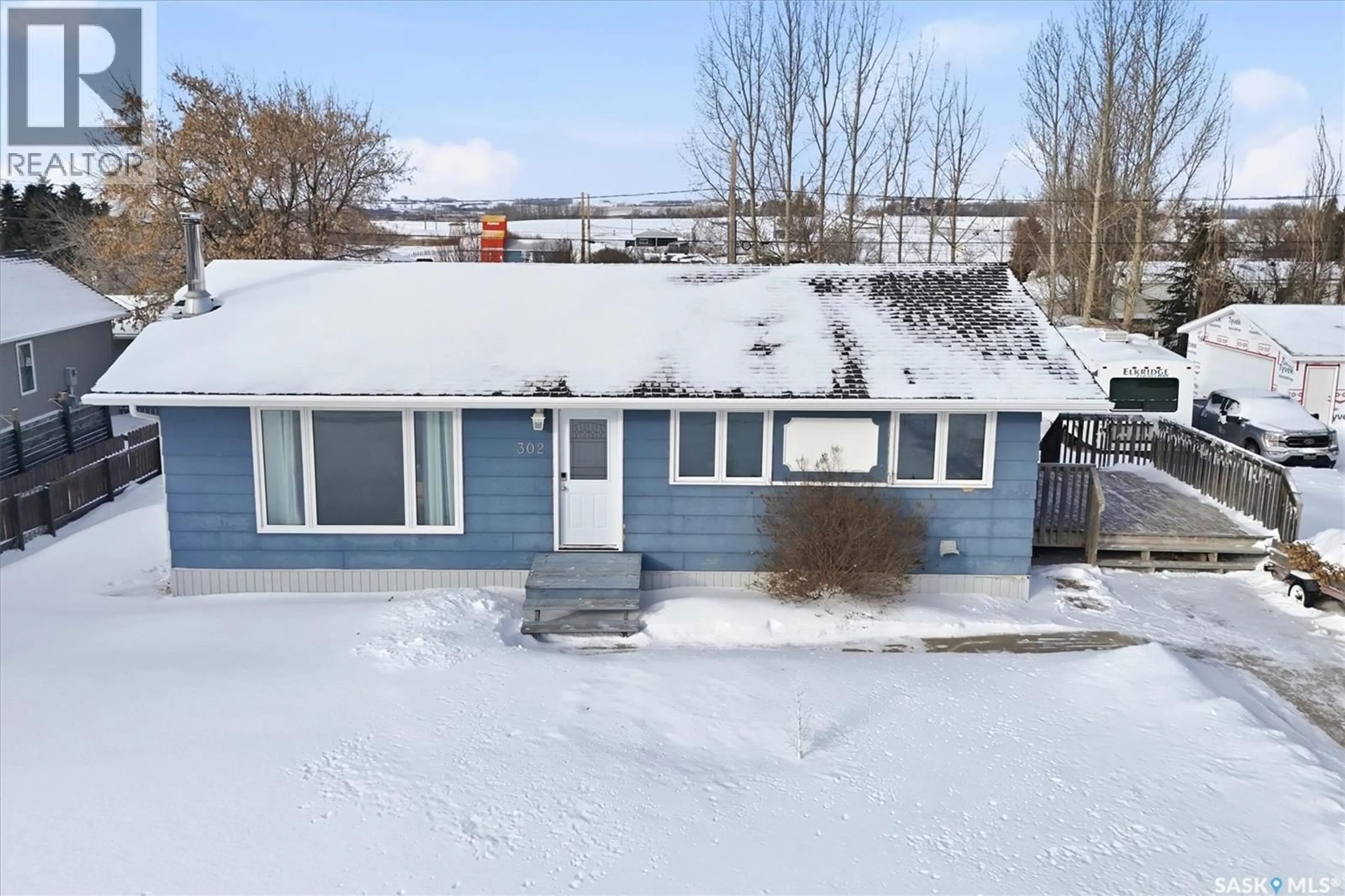 A pic from outside/outdoor area/front of a property/back of a property/a pic from drone, street for 302 3RD STREET, Delisle Saskatchewan S0L0P0