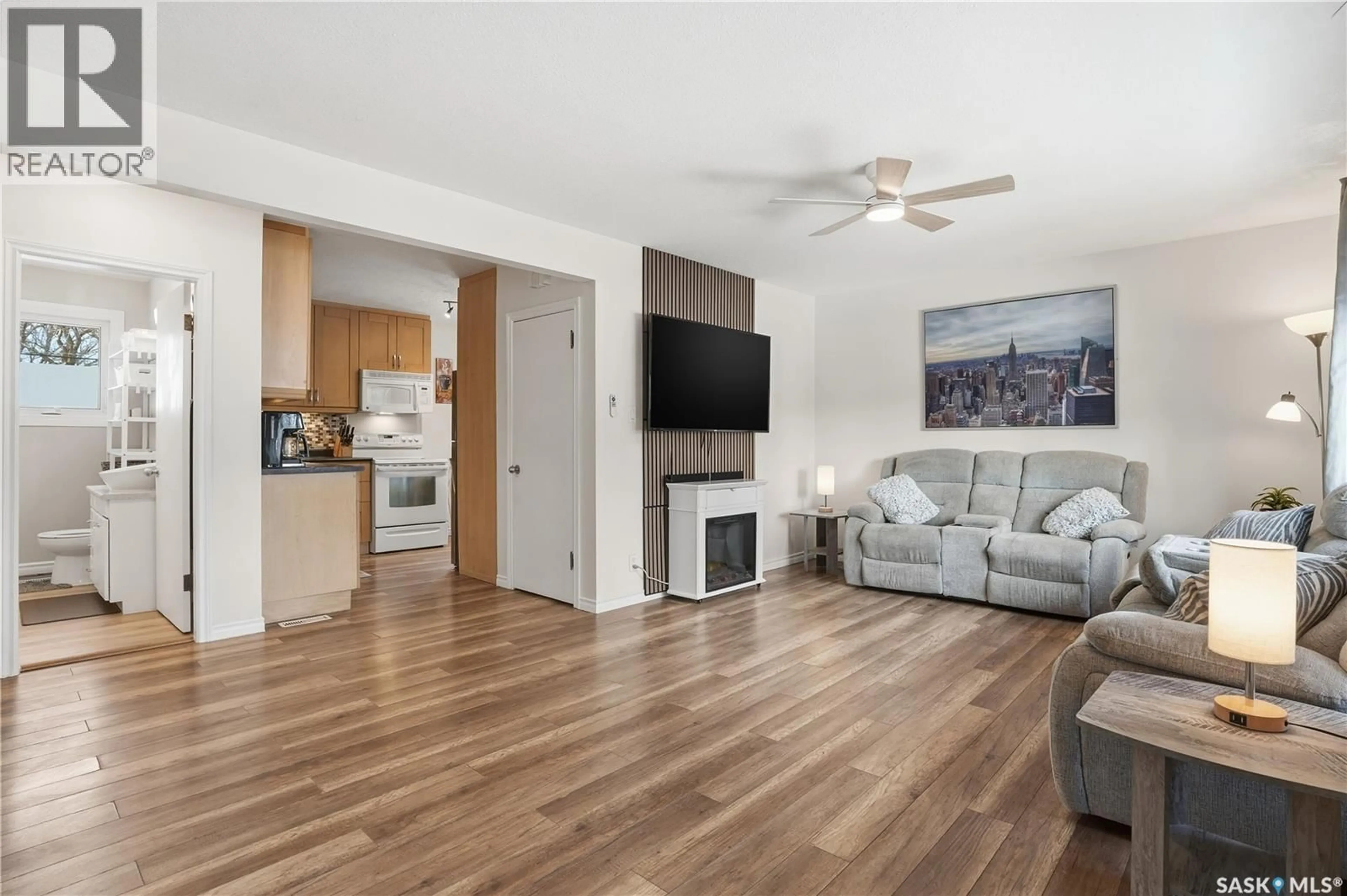 Living room with furniture, wood/laminate floor for 800 ROYAL STREET, Regina Saskatchewan S4T4Z4