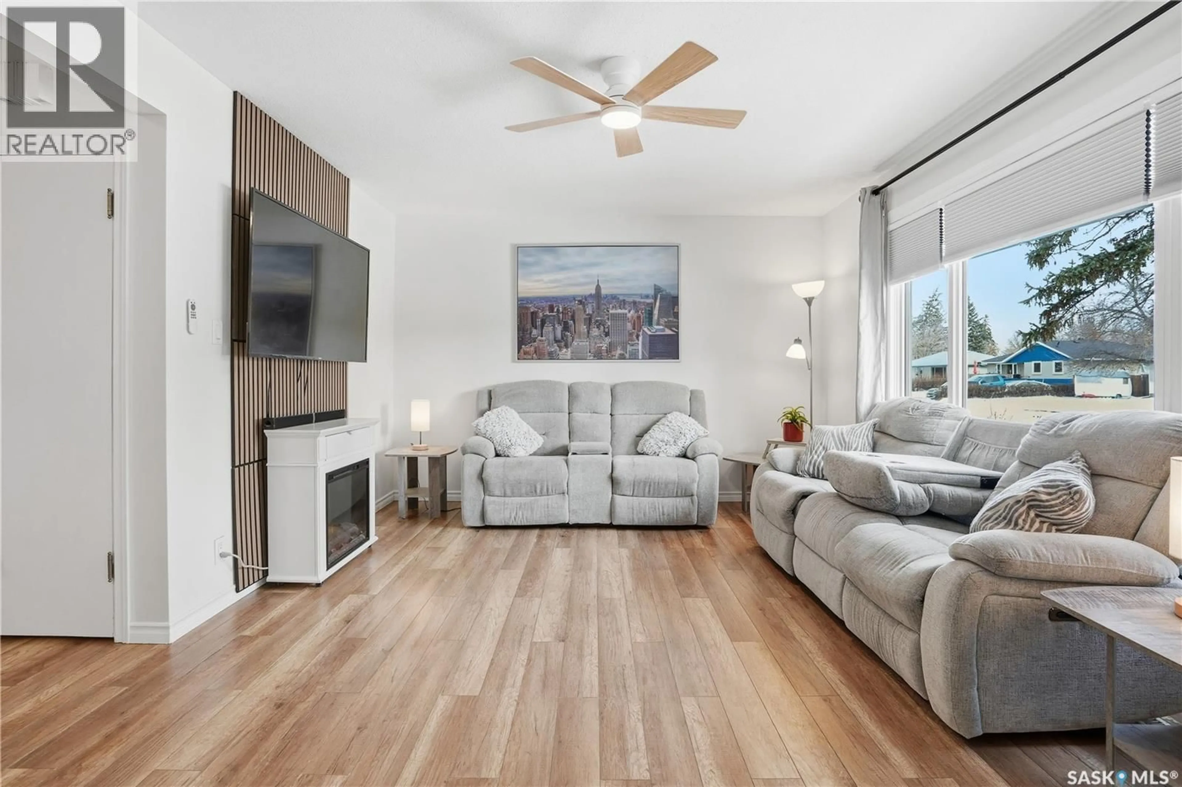 Living room with furniture, wood/laminate floor for 800 ROYAL STREET, Regina Saskatchewan S4T4Z4