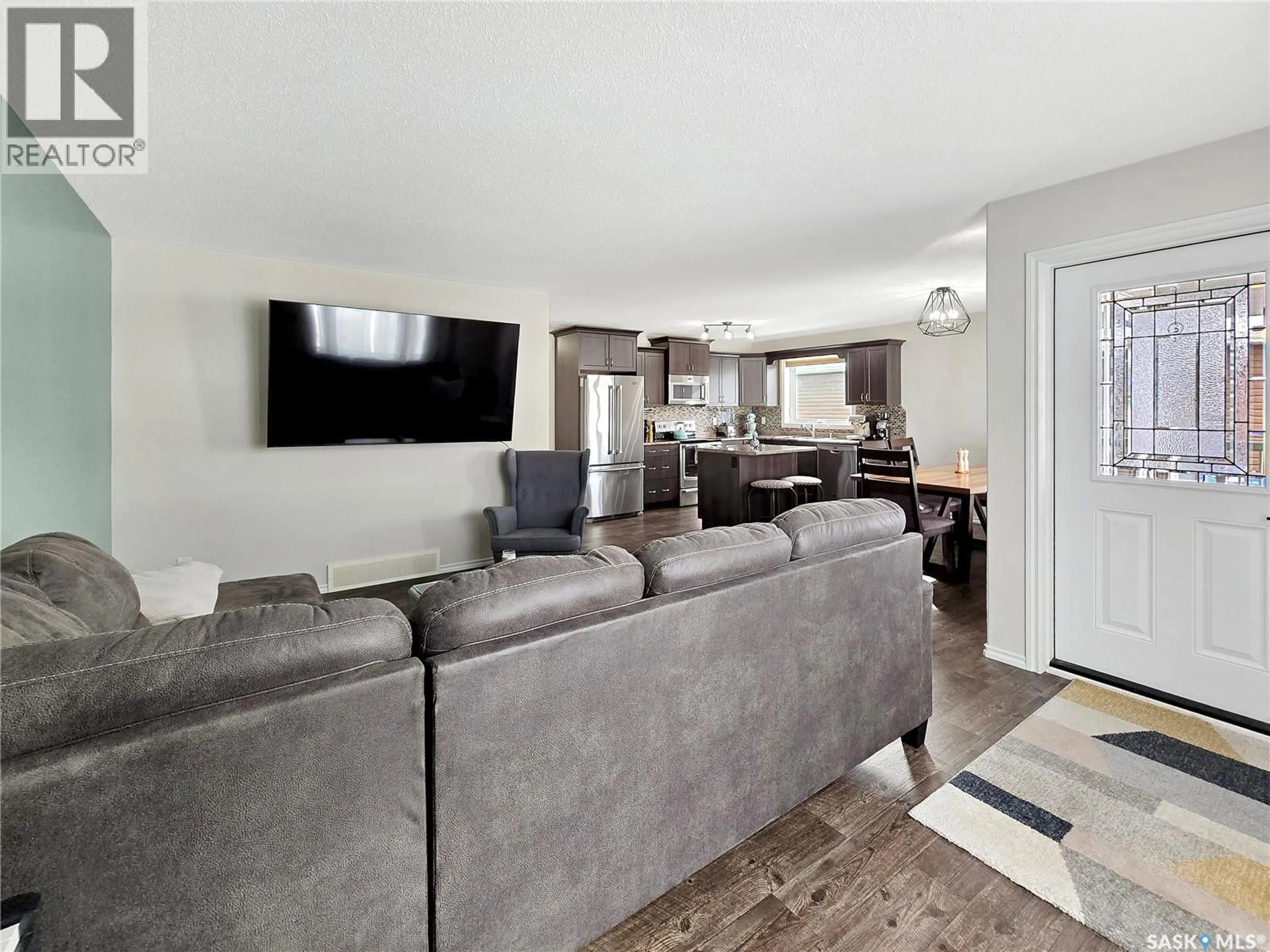 Living room with furniture, unknown for 2 CJ HOUSTON PLACE, Yorkton Saskatchewan S3N4J3