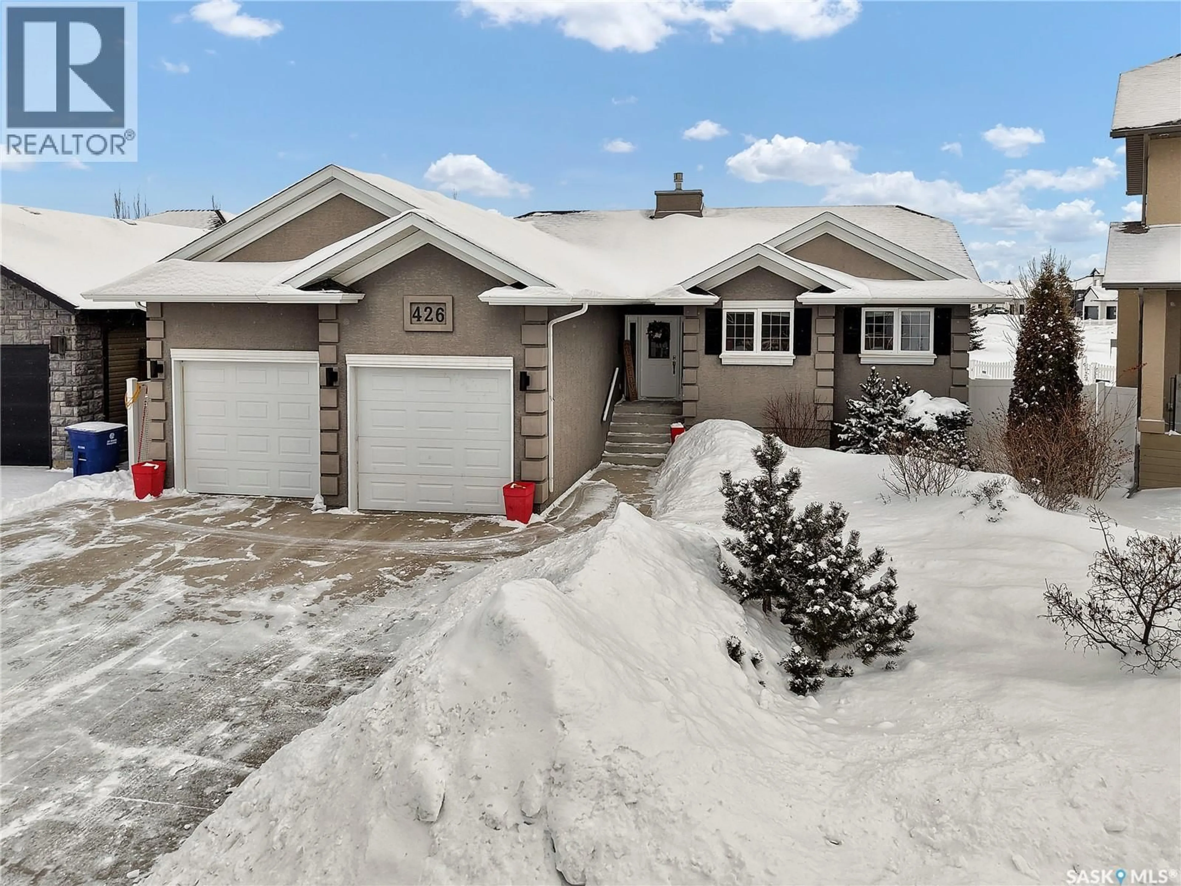 A pic from outside/outdoor area/front of a property/back of a property/a pic from drone, street for 426 LYLE CRESCENT, Warman Saskatchewan S0K4S1