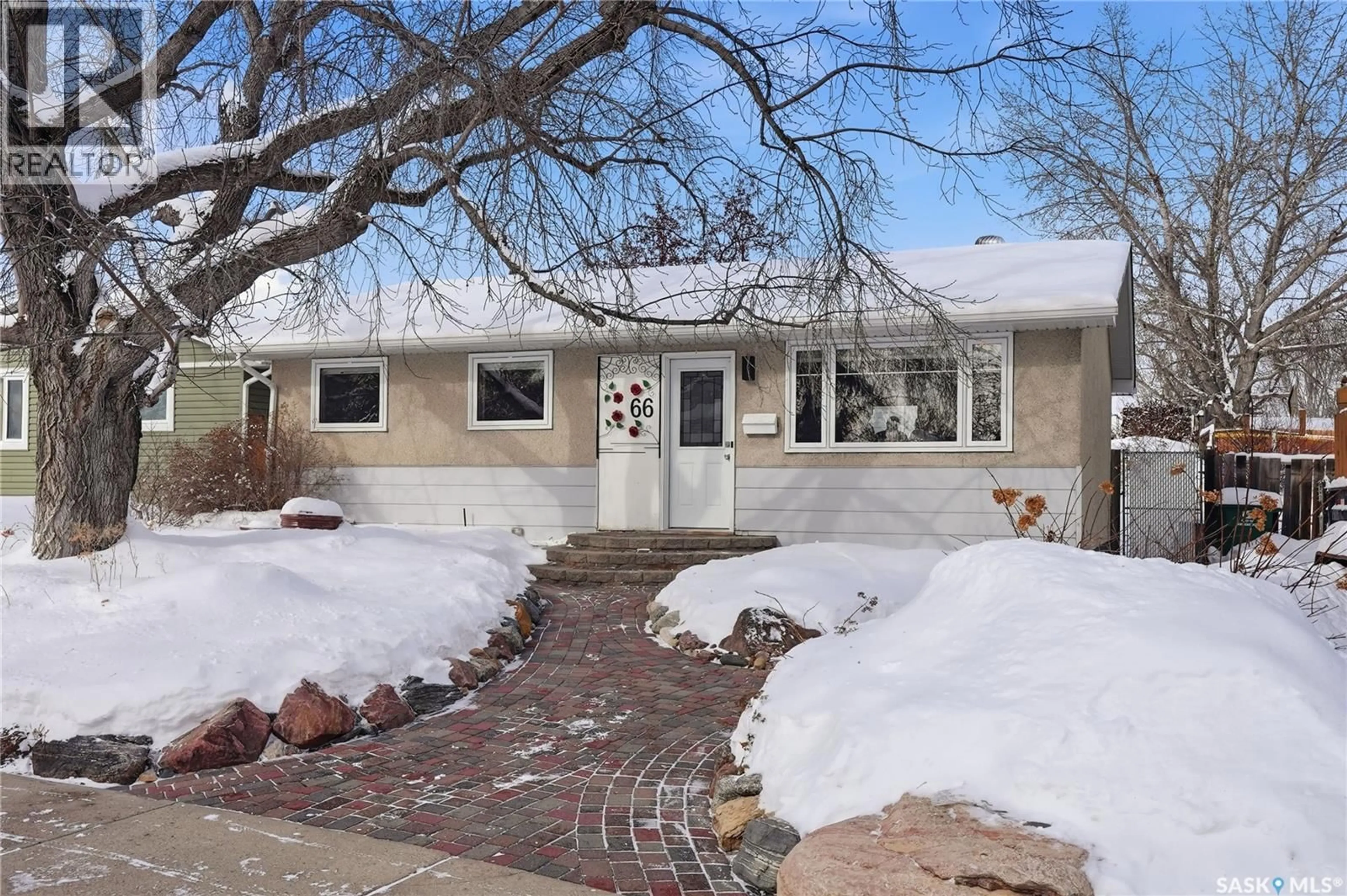 Home with brick exterior material, street for 66 CONFEDERATION CRESCENT, Saskatoon Saskatchewan S7L4V2