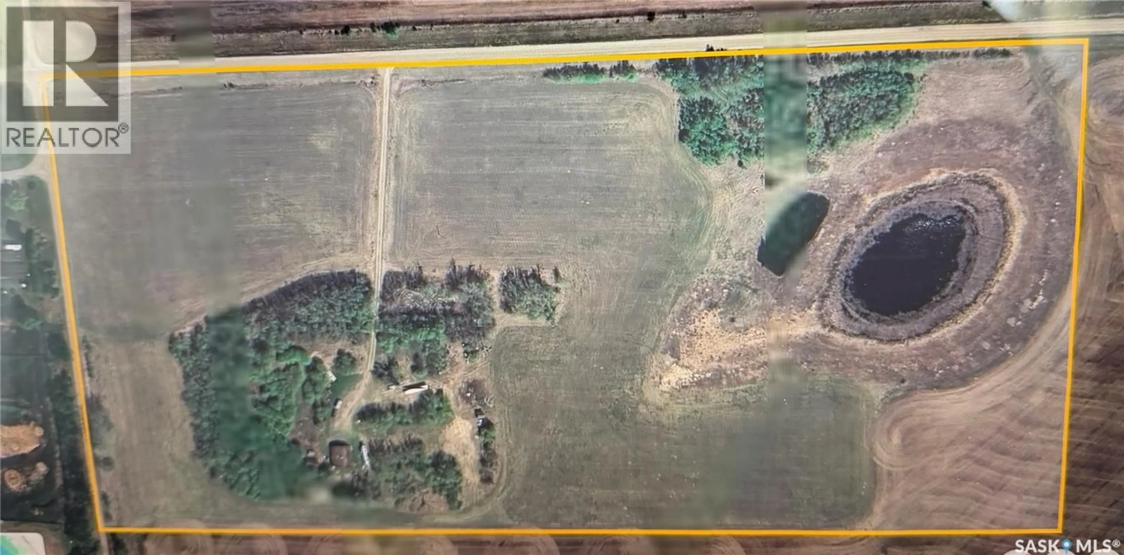 A pic from outside/outdoor area/front of a property/back of a property/a pic from drone, building for YORKTON ACREAGE, Orkney Rm No. 244 Saskatchewan S3N4K1