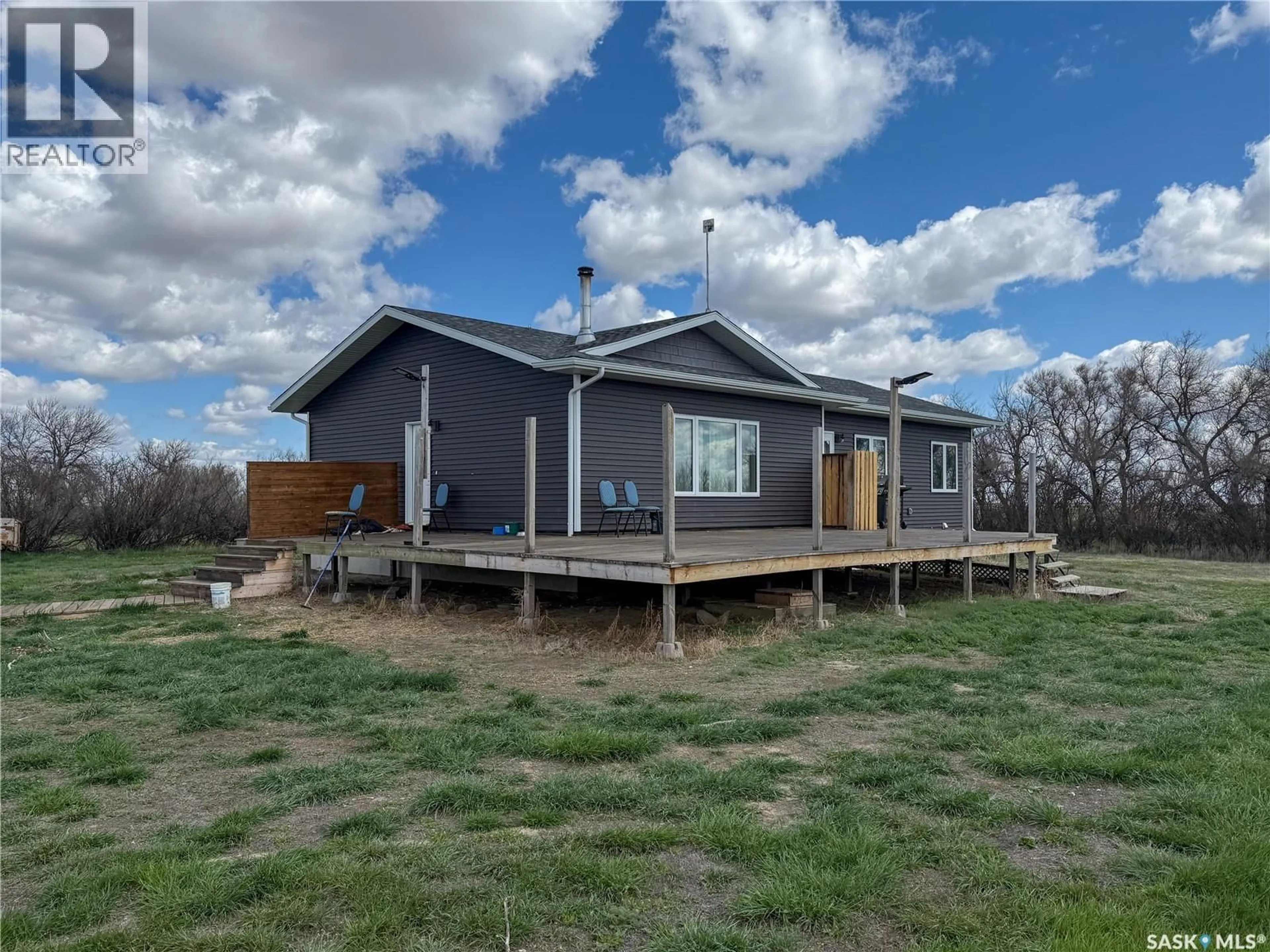 A pic from outside/outdoor area/front of a property/back of a property/a pic from drone, building for HAZLET ACREAGE, Pittville Rm No. 169 Saskatchewan S0N1E0