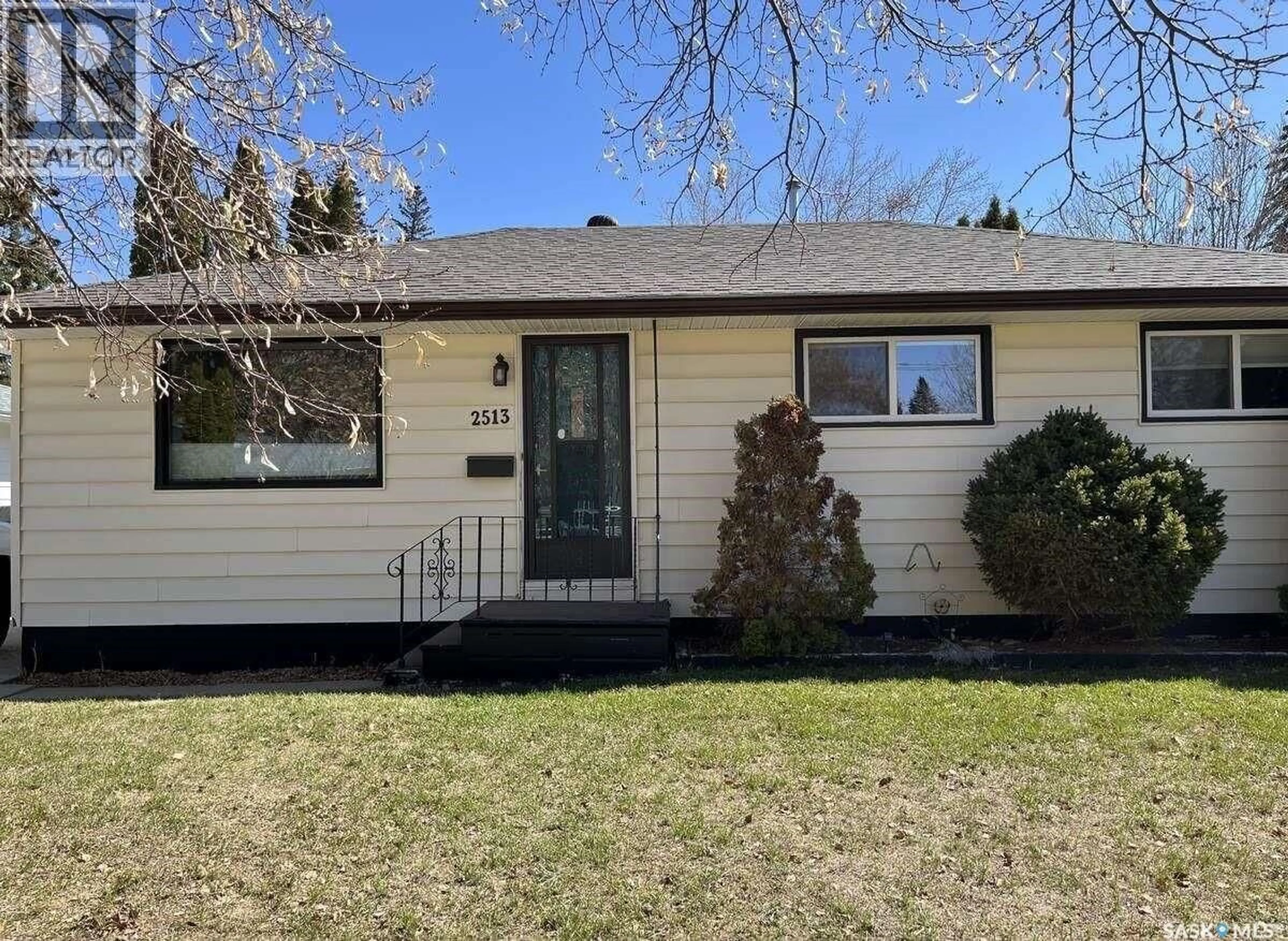 Home with vinyl exterior material, street for 2513 CAIRNS AVENUE, Saskatoon Saskatchewan S7J1V4