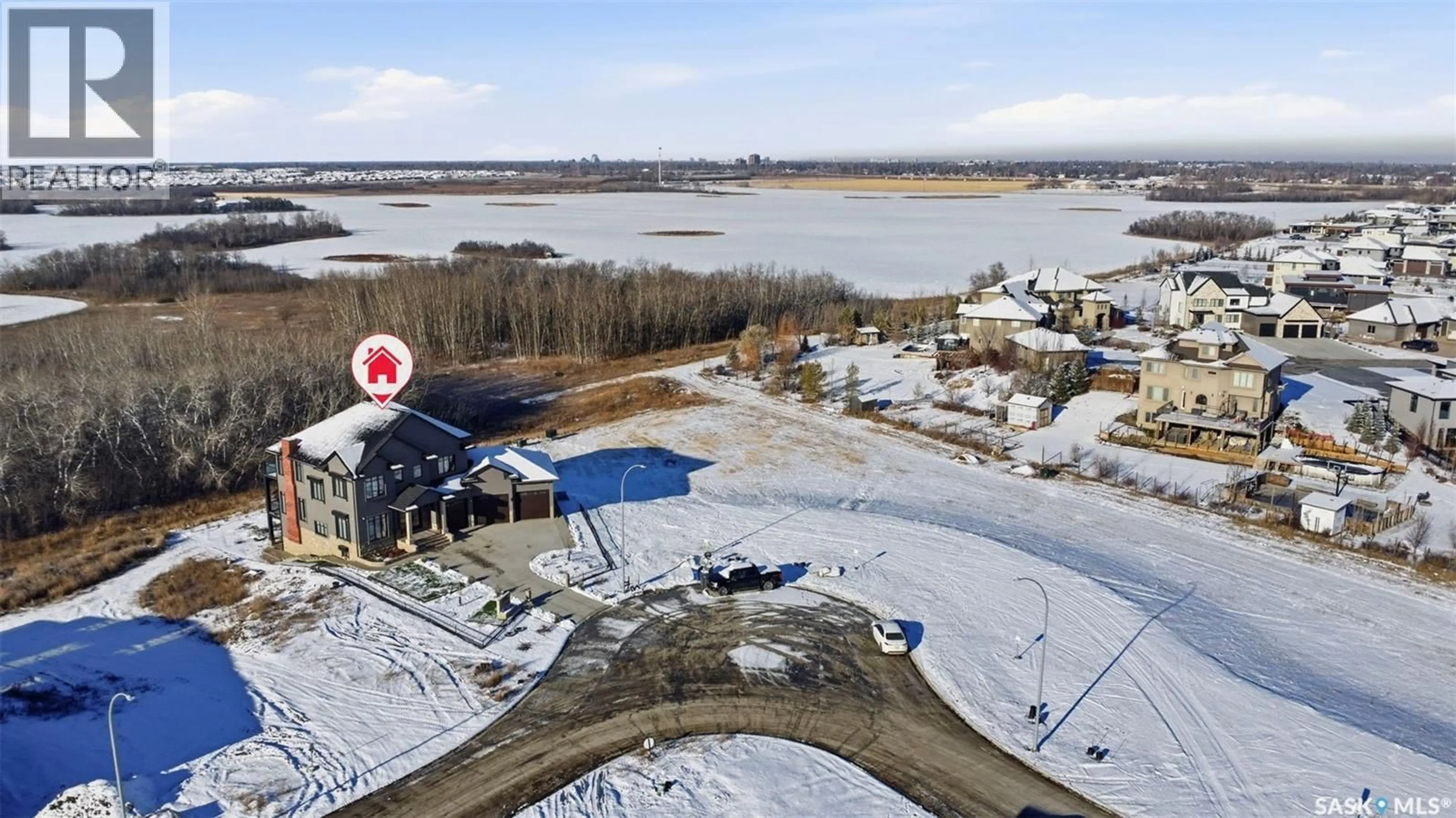 A pic from outside/outdoor area/front of a property/back of a property/a pic from drone, water/lake/river/ocean view for 529 GREENBRYRE BEND, Corman Park Rm No. 344 Saskatchewan S7V1T9