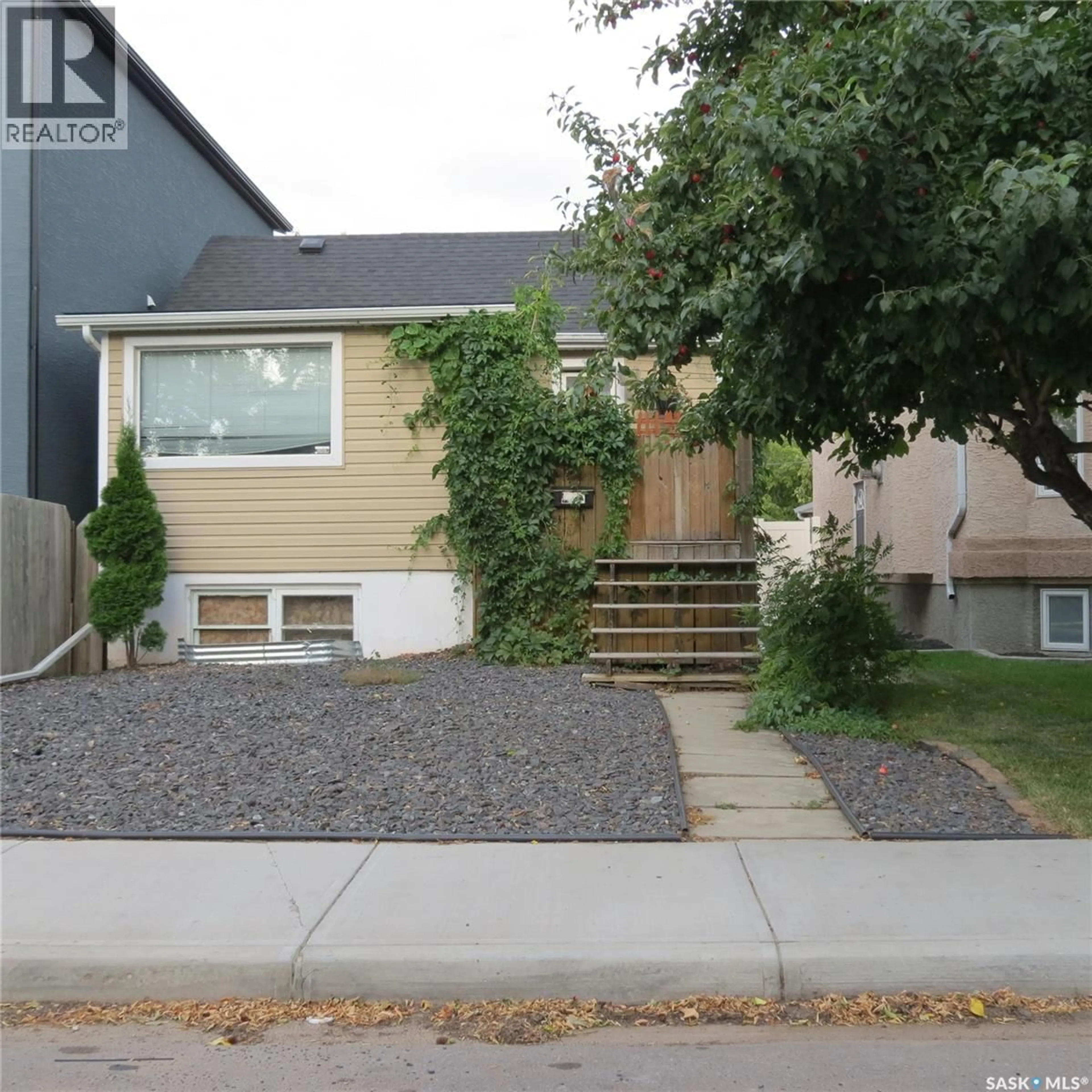 Home with vinyl exterior material, street for 2256 WASCANA STREET, Regina Saskatchewan S4T4K2