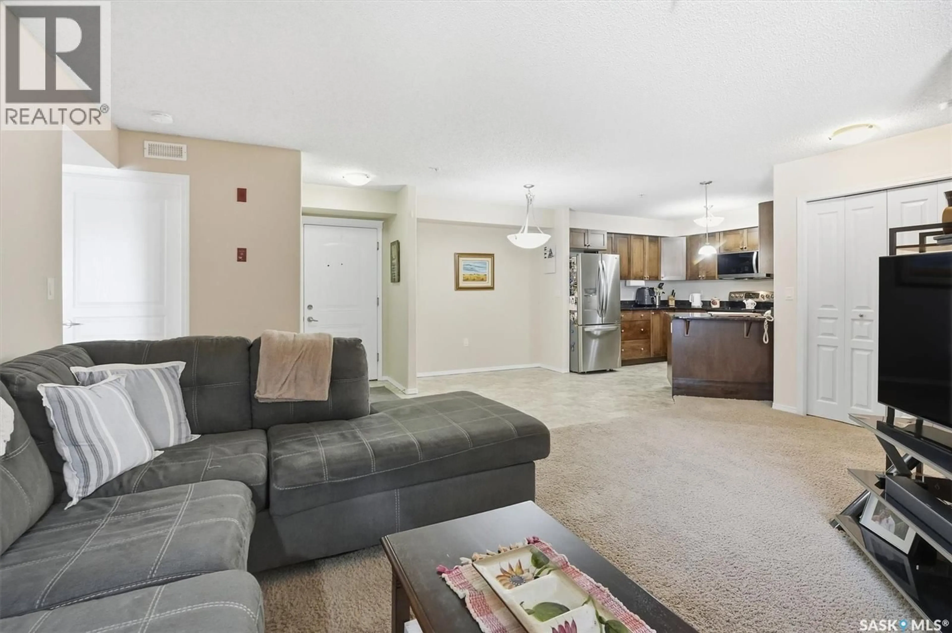 Living room with furniture, unknown for 150 - 115 PAWLYCHENKO LANE, Saskatoon Saskatchewan S7V0B4