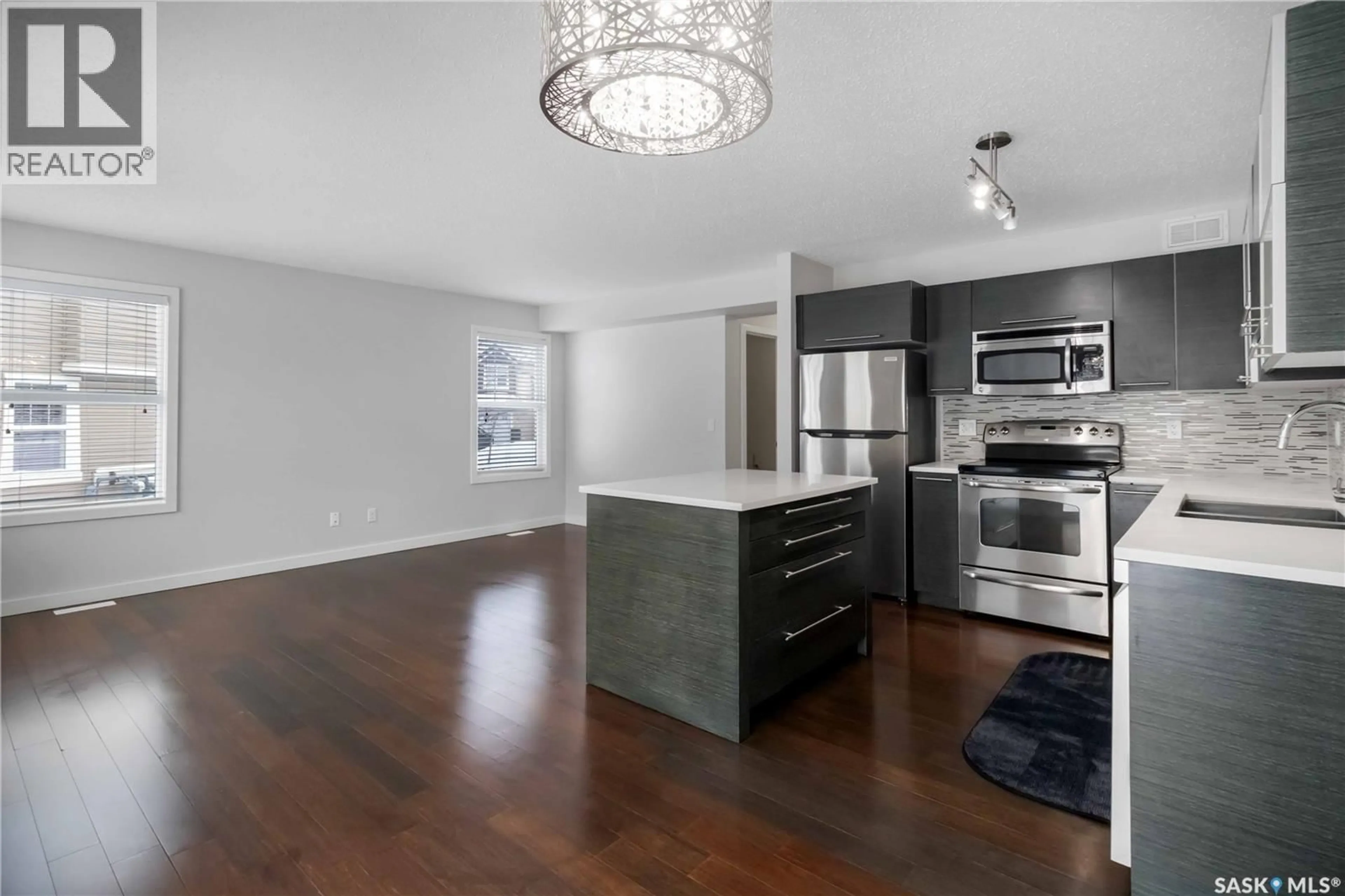 Open concept kitchen, unknown for 410 - 215 LEDINGHAM WAY, Saskatoon Saskatchewan S7V0C4
