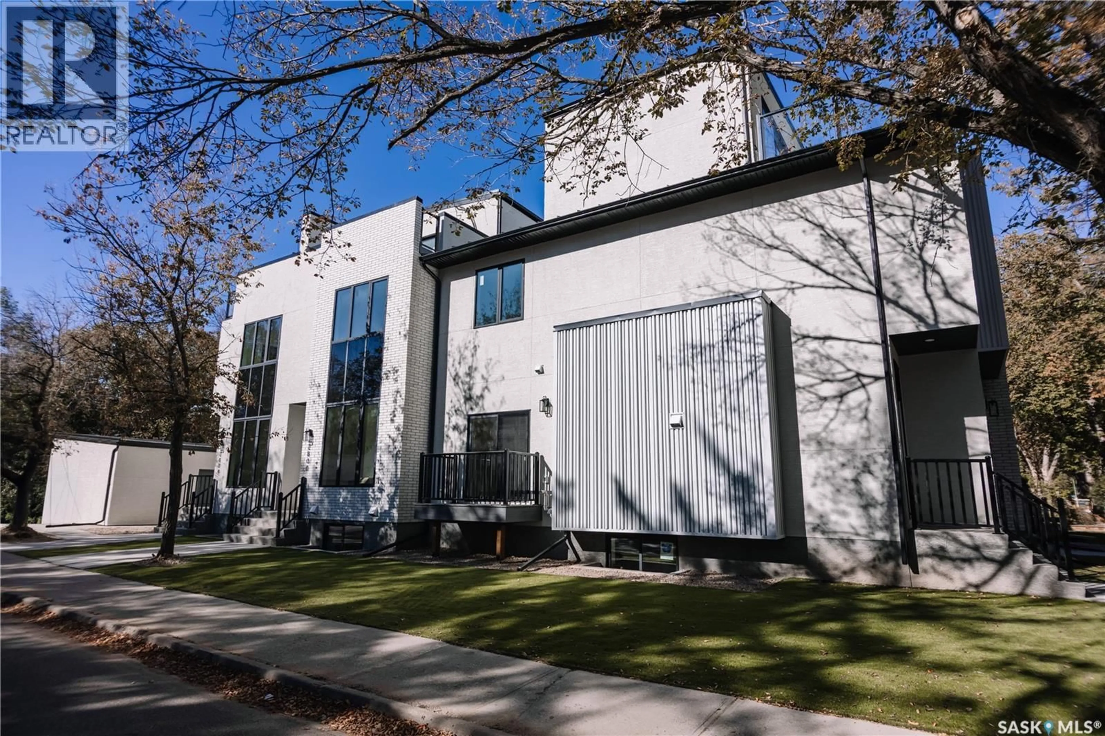 Home with vinyl exterior material, street for 2800 14TH AVENUE, Regina Saskatchewan S4T5S8