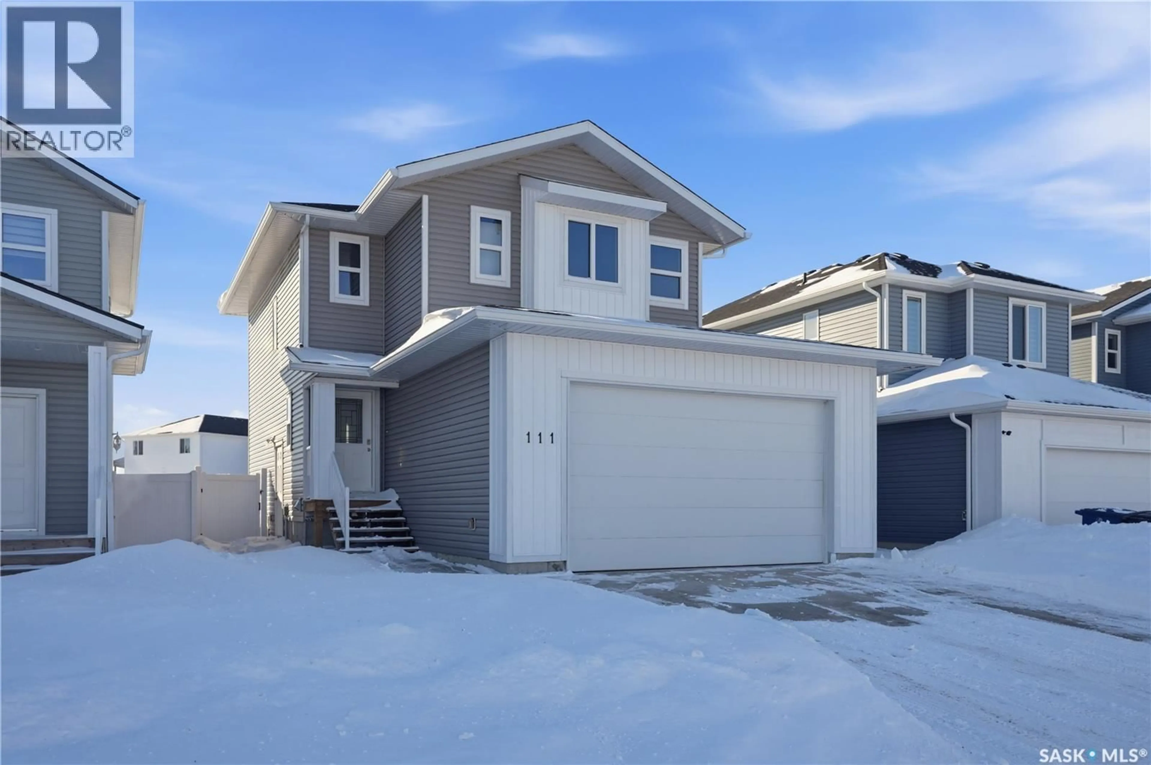 Home with vinyl exterior material, street for 111 STROMBERG CRESCENT, Saskatoon Saskatchewan S7L7C4