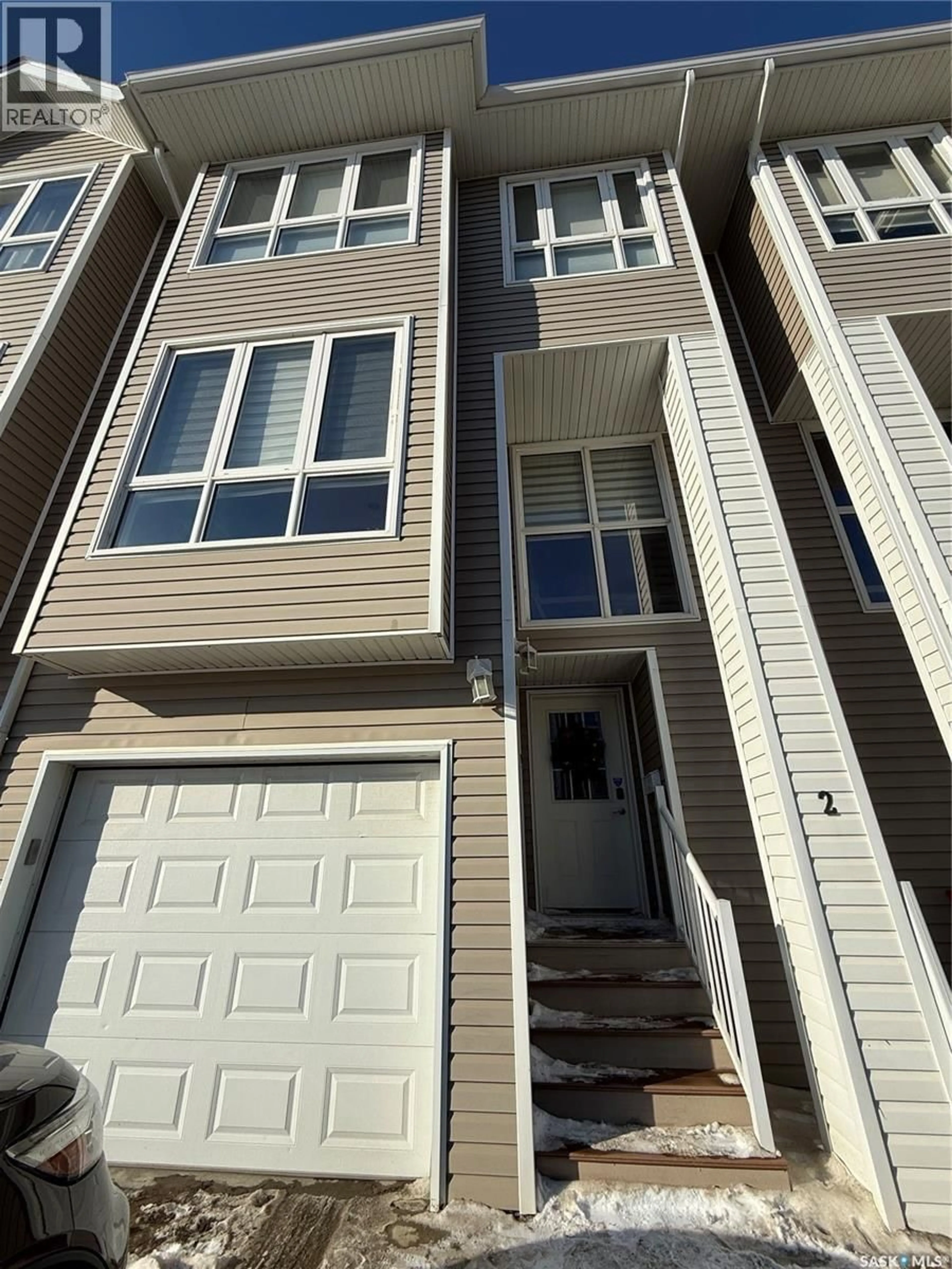 Home with vinyl exterior material, street for 2 697 SUN VALLEY DRIVE, Estevan Saskatchewan S4A2X7