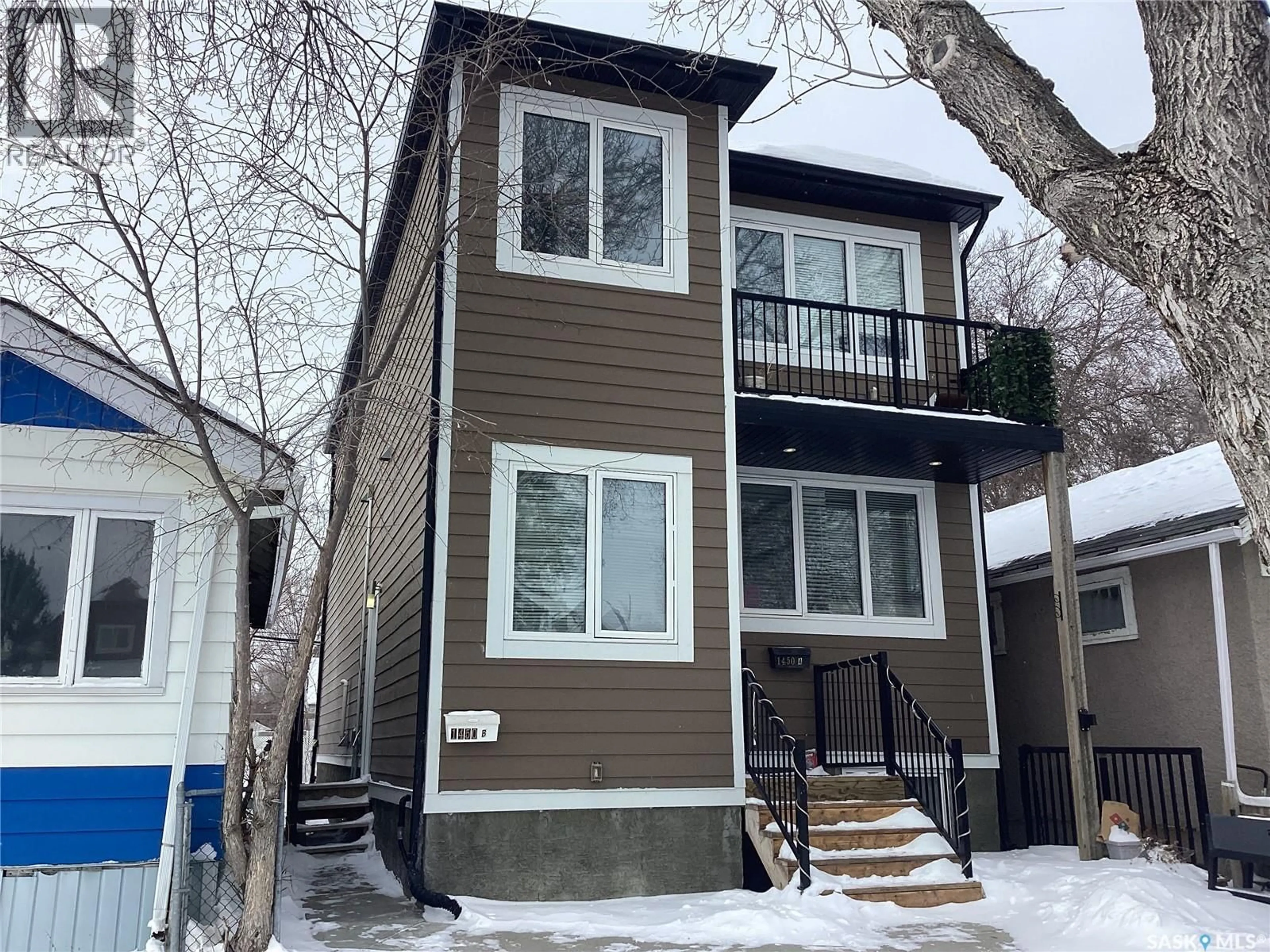 Home with vinyl exterior material, street for 1450 WASCANA STREET, Regina Saskatchewan S4T4J5