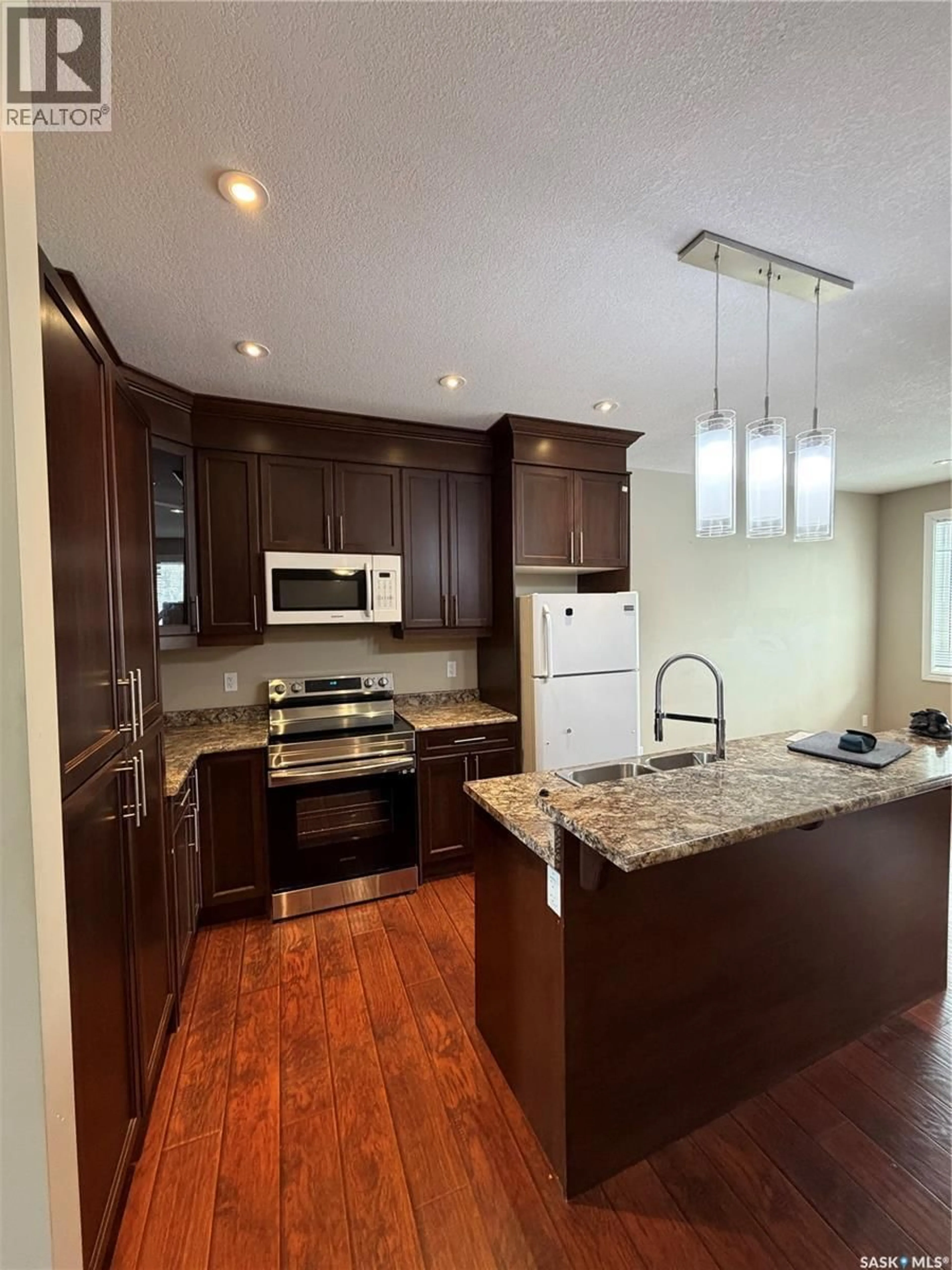 Open concept kitchen, unknown for 1450 WASCANA STREET, Regina Saskatchewan S4T4J5