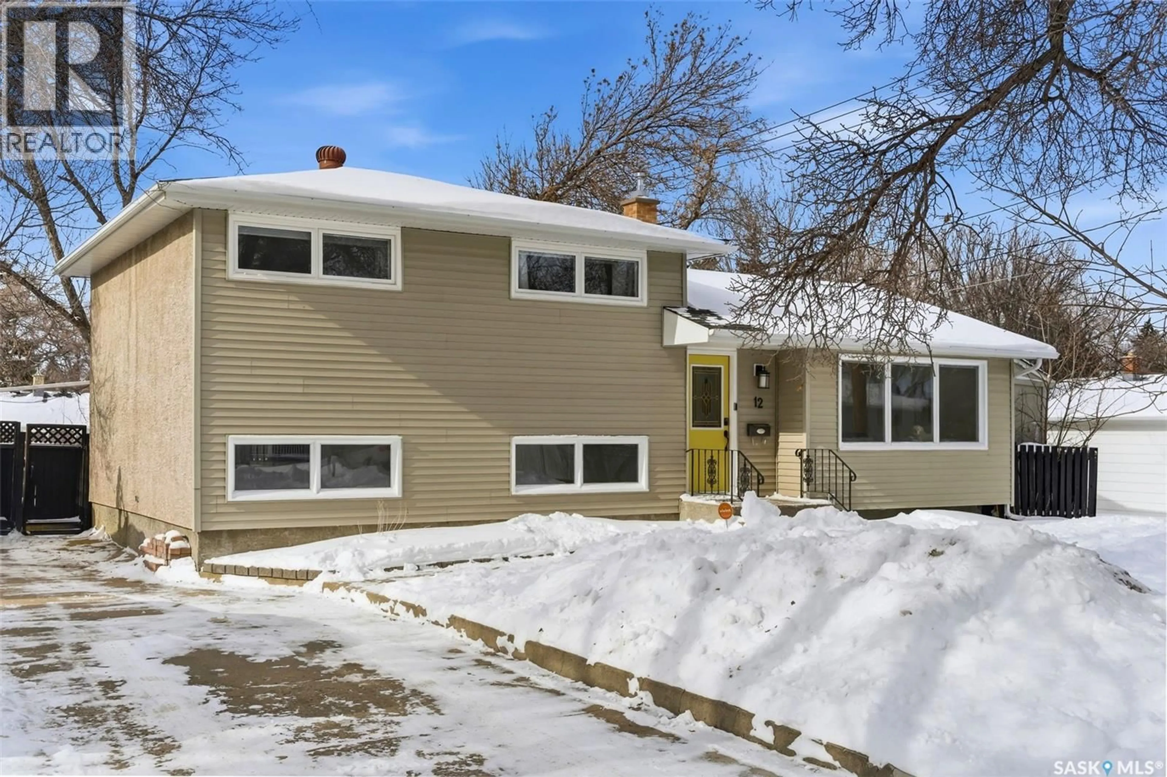 Home with vinyl exterior material, street for 12 MONTGOMERY ROAD, Regina Saskatchewan S4S5C4