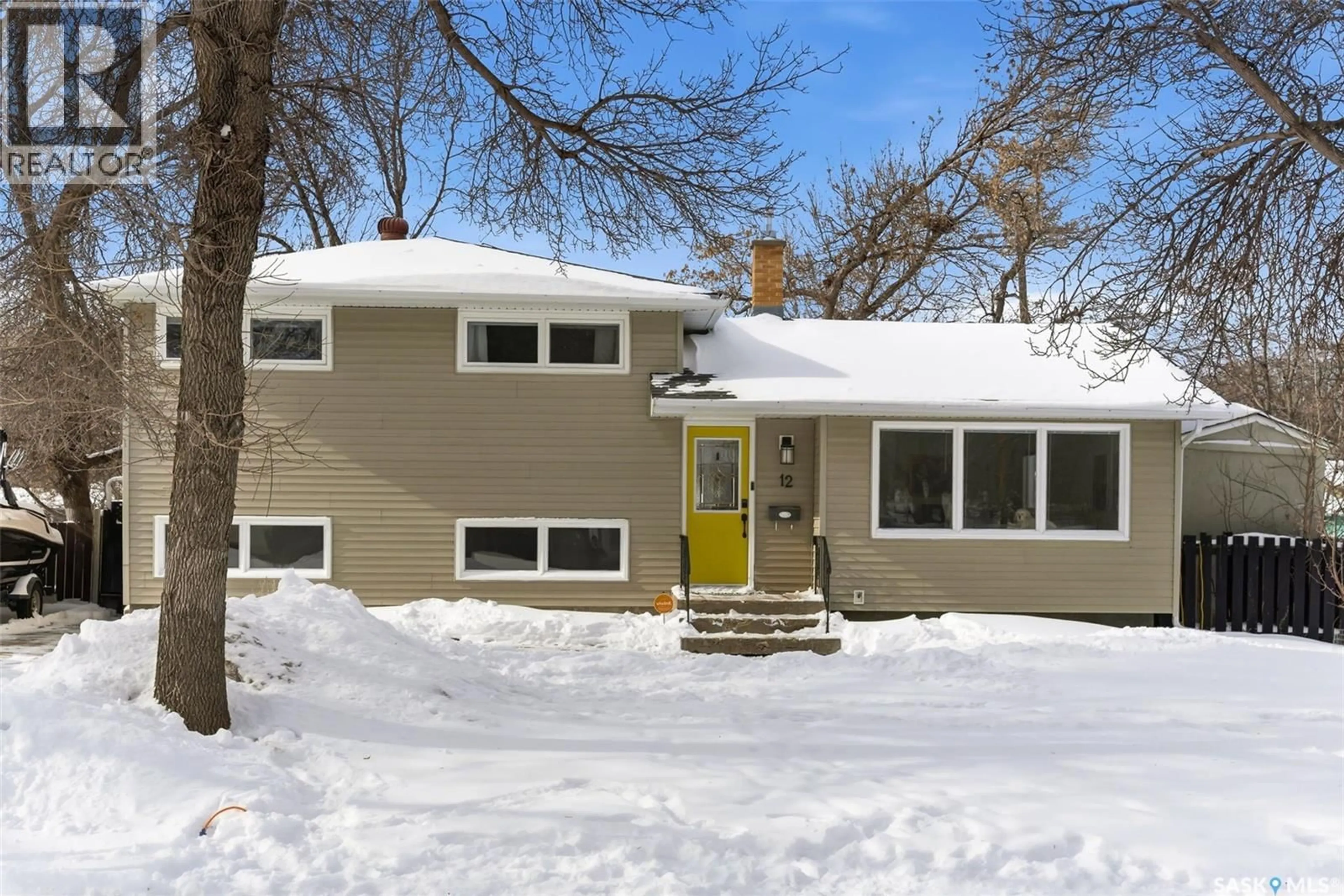 Home with vinyl exterior material, street for 12 MONTGOMERY ROAD, Regina Saskatchewan S4S5C4