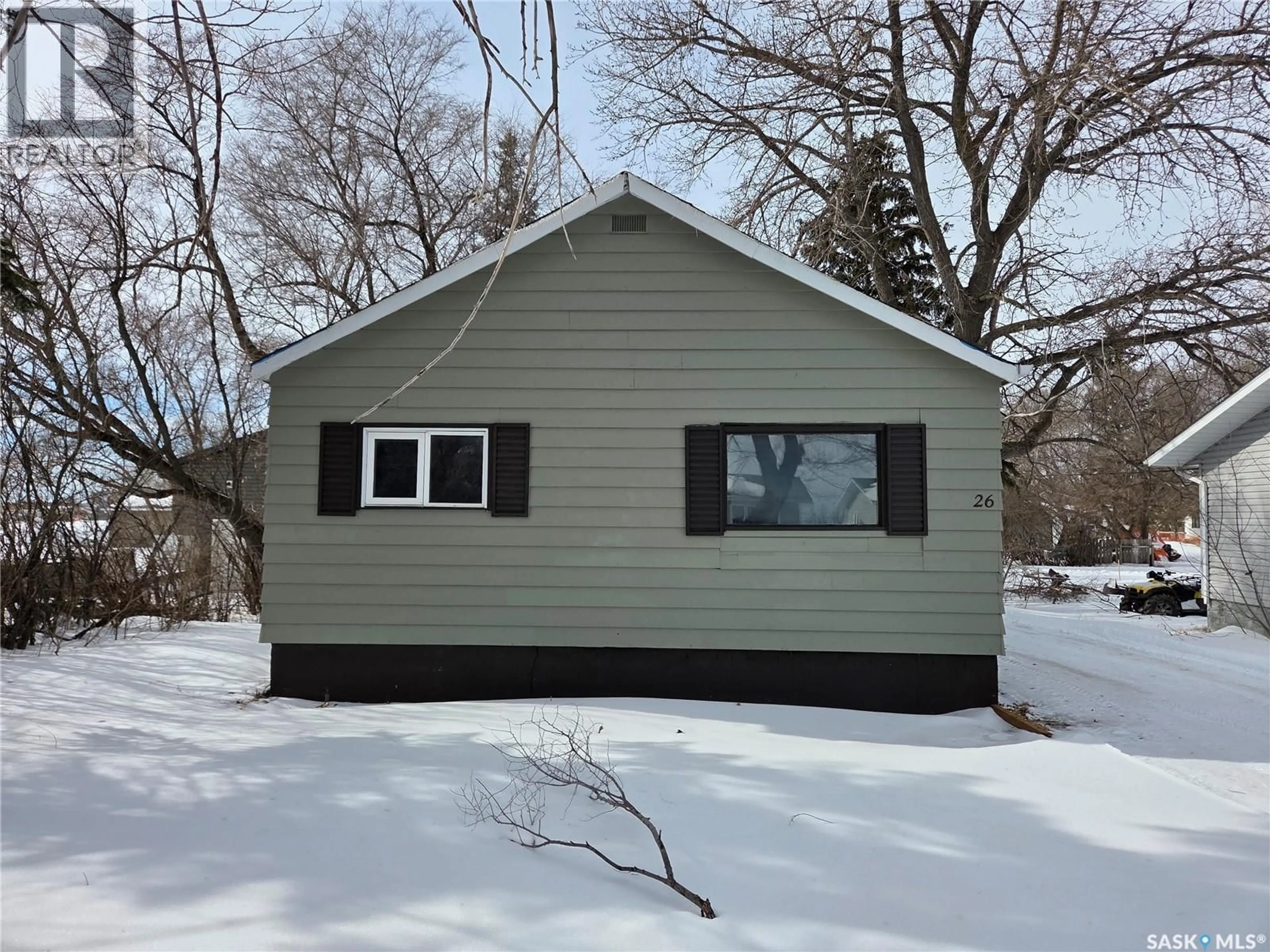 Home with vinyl exterior material, street for 26 FRASER STREET, Manor Saskatchewan S0C1R0