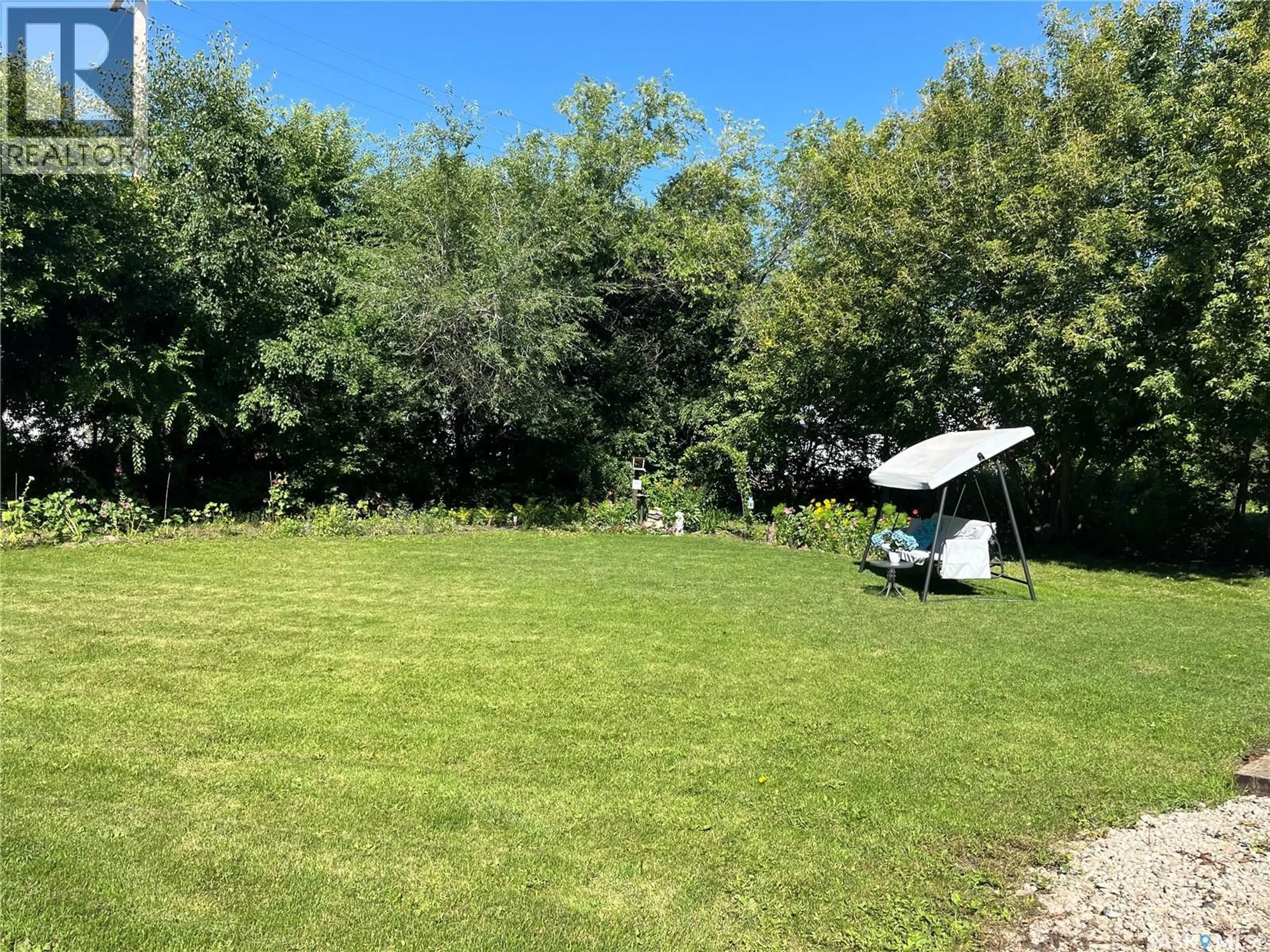 A pic from outside/outdoor area/front of a property/back of a property/a pic from drone, forest/trees view for 225 FIRST STREET, Wadena Saskatchewan S0A4J0