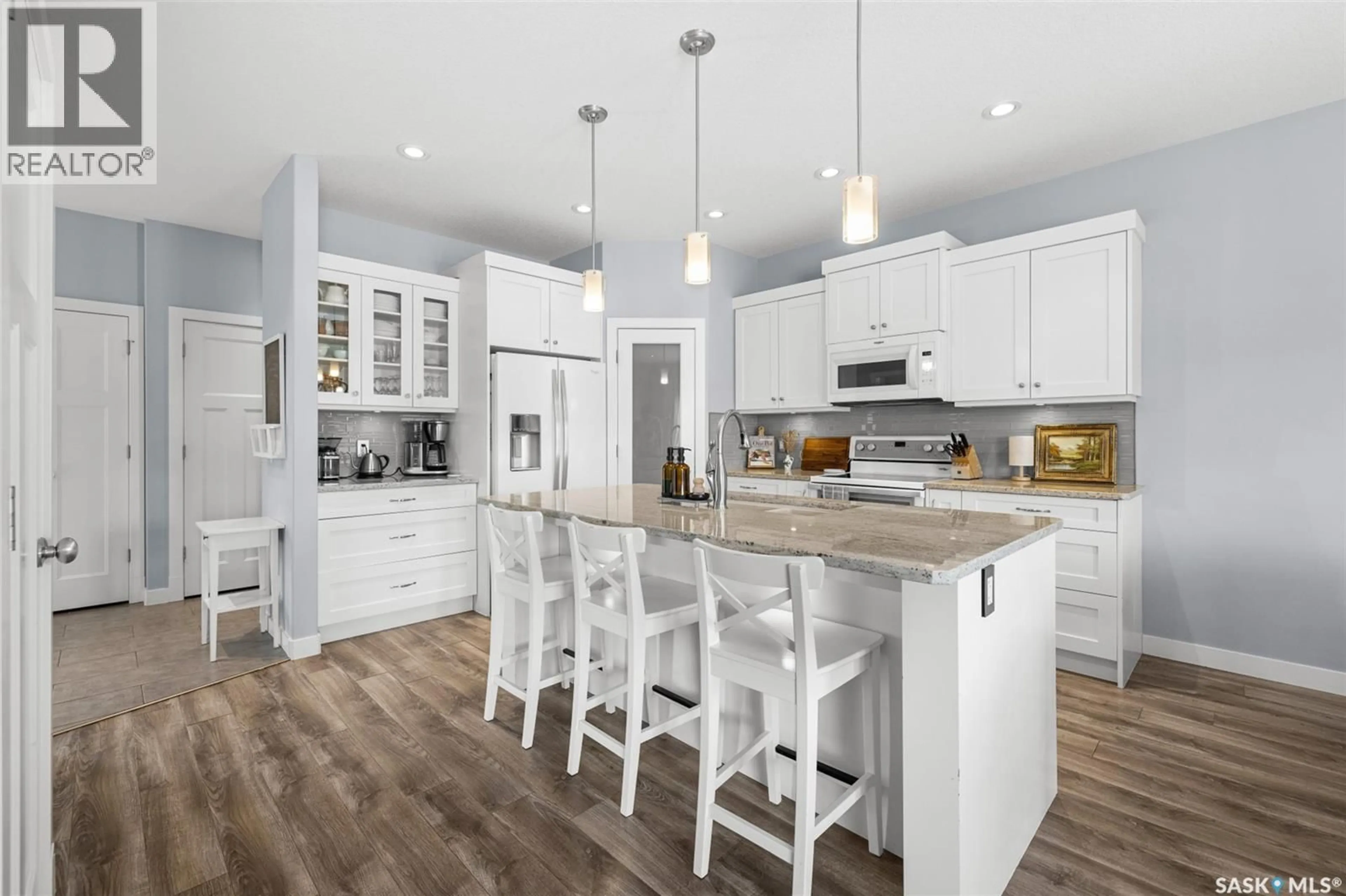 Open concept kitchen, wood/laminate floor for 5492 AERIAL CRESCENT, Regina Saskatchewan S4W0C9