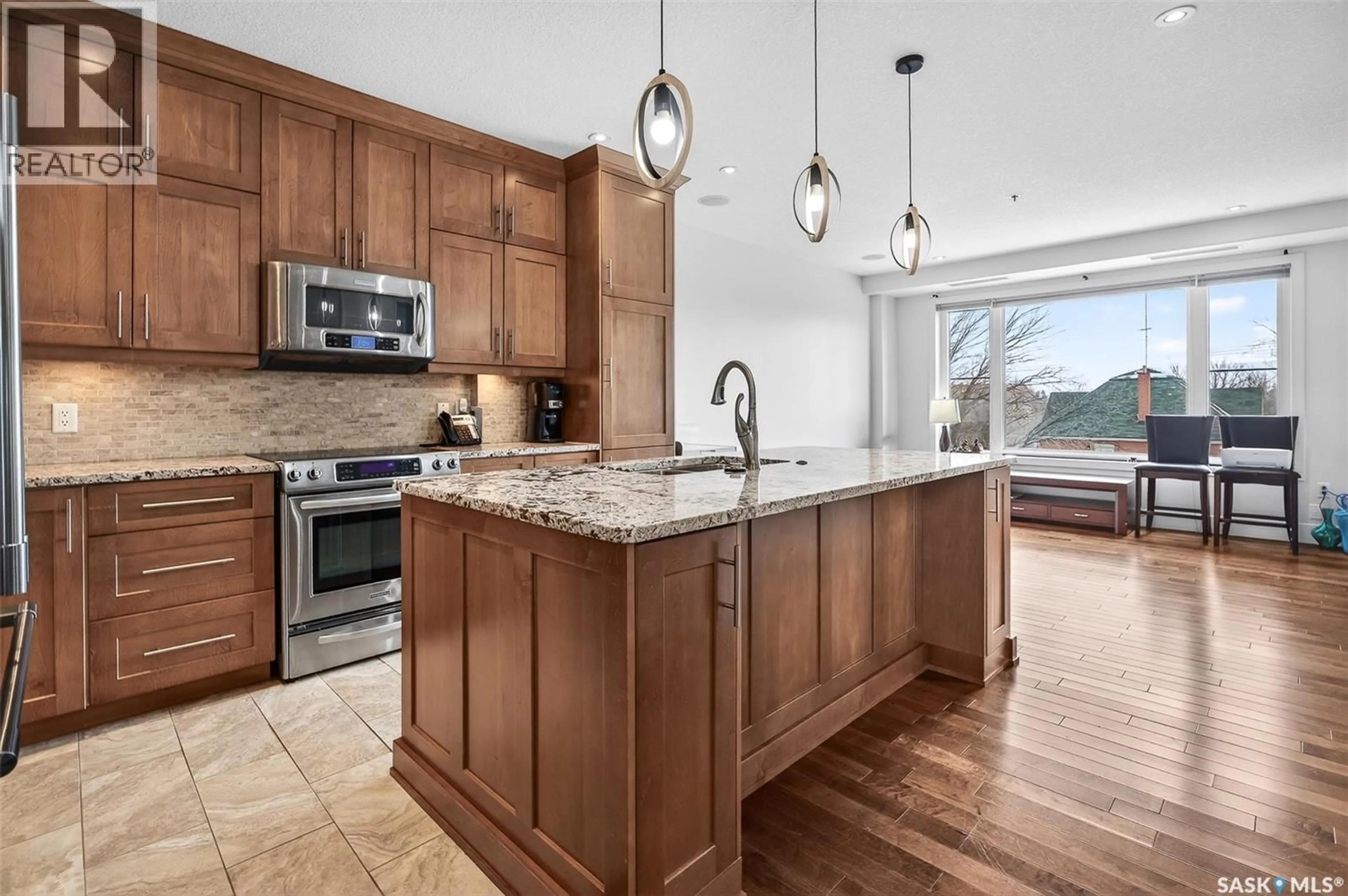 Open concept kitchen, ceramic/tile floor for 308 - 205 FAIRFORD STREET, Moose Jaw Saskatchewan S6H0E1