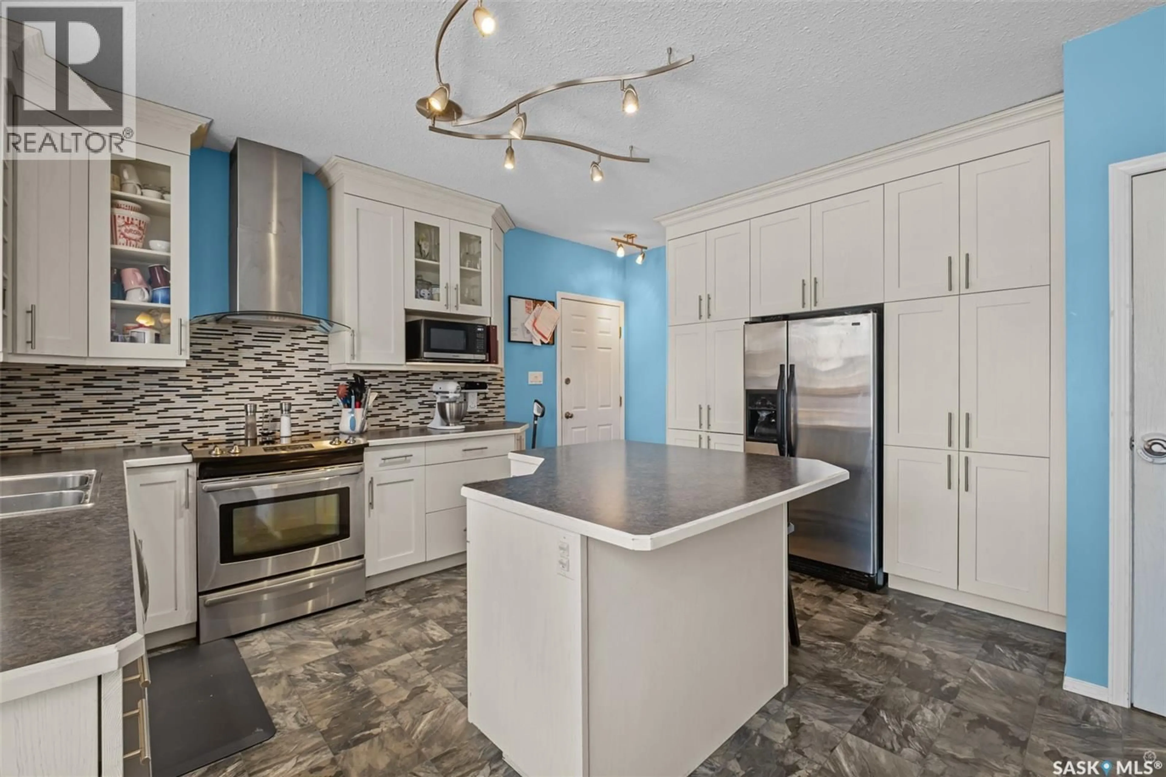 Open concept kitchen, ceramic/tile floor for 1723 ALLBRIGHT CRESCENT, Prince Albert Saskatchewan S6V7C6
