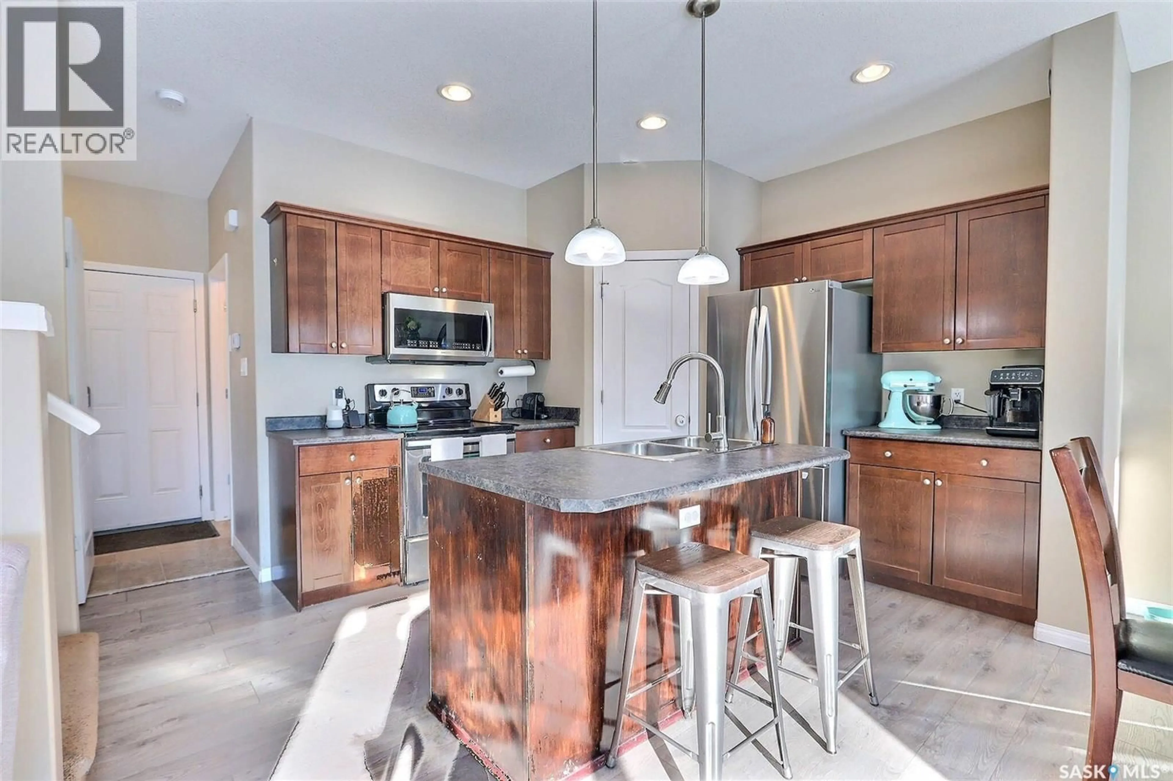 Open concept kitchen, ceramic/tile floor for 16 GUY DRIVE, Prince Albert Saskatchewan S6V0A3