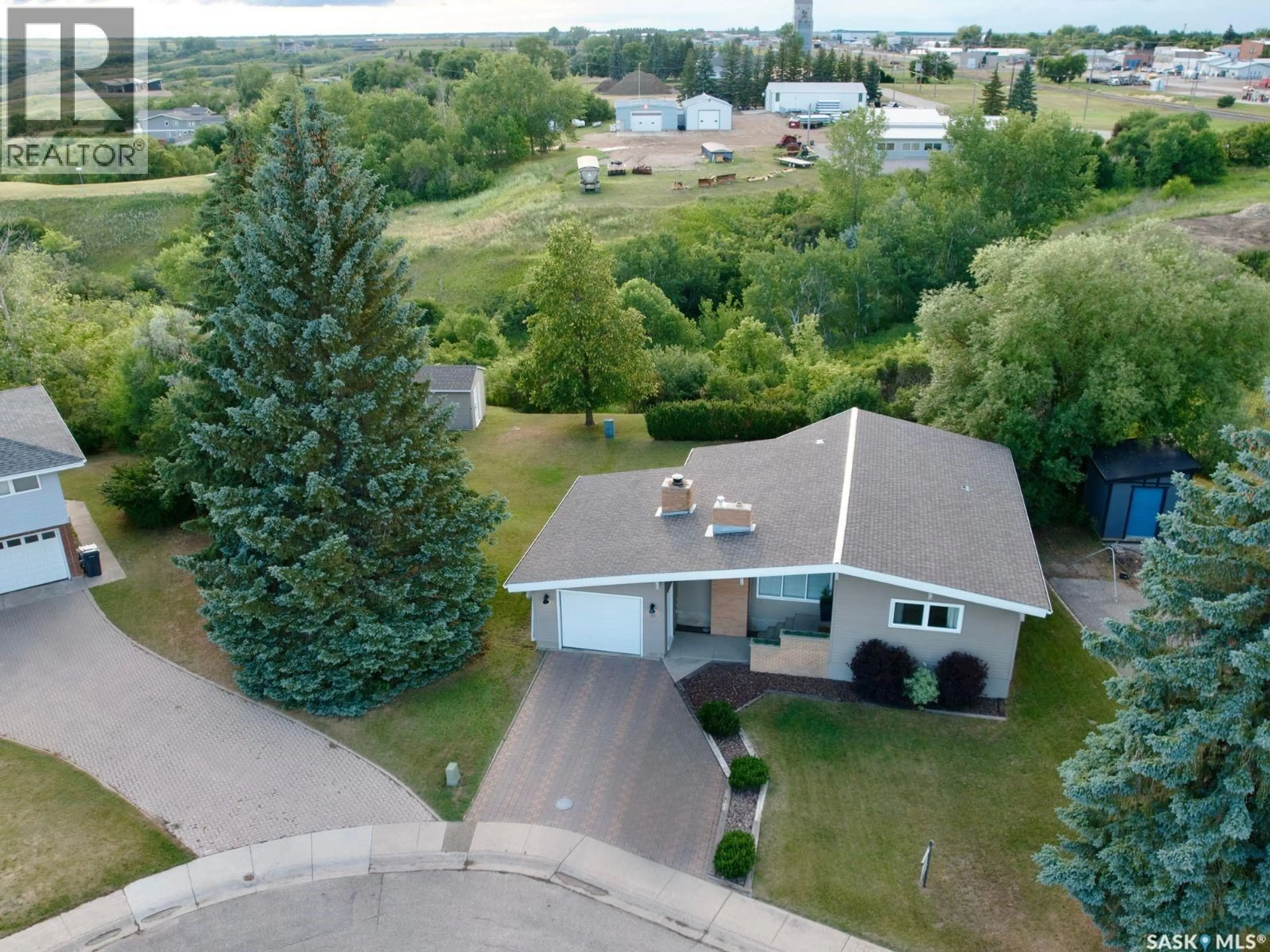 A pic from outside/outdoor area/front of a property/back of a property/a pic from drone, unknown for 91 MOIR DRIVE, Oxbow Saskatchewan S0C2B0