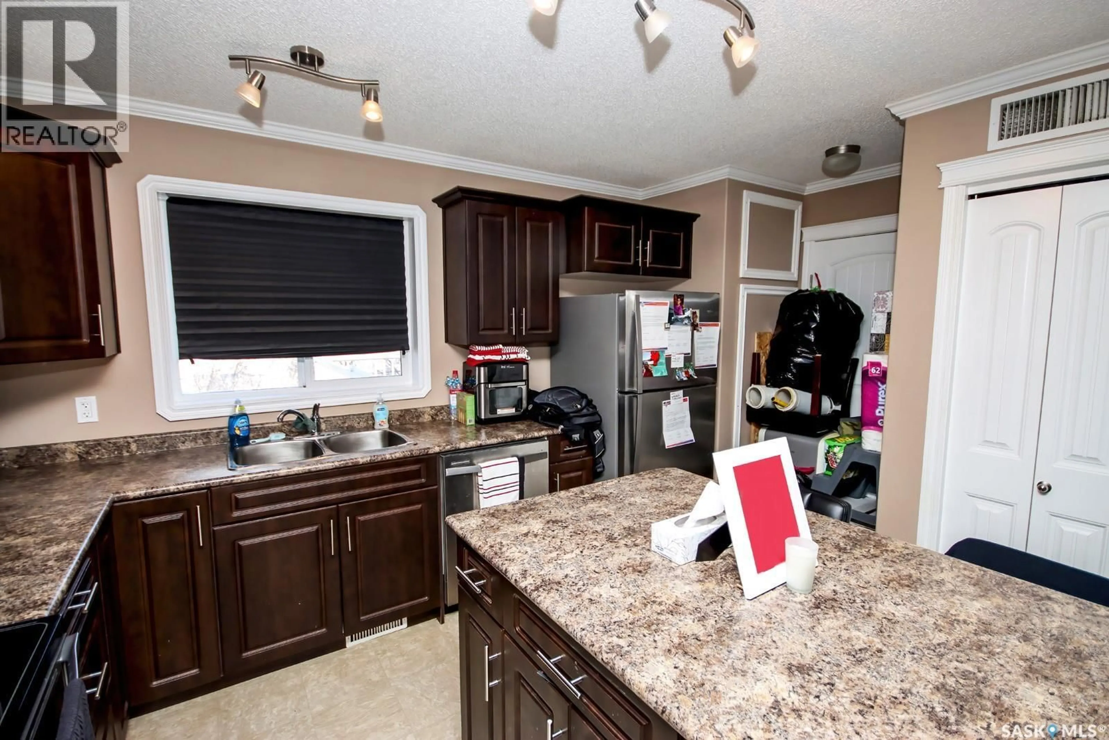 Open concept kitchen, unknown for 1805 3RD STREET, Estevan Saskatchewan S4A0T1