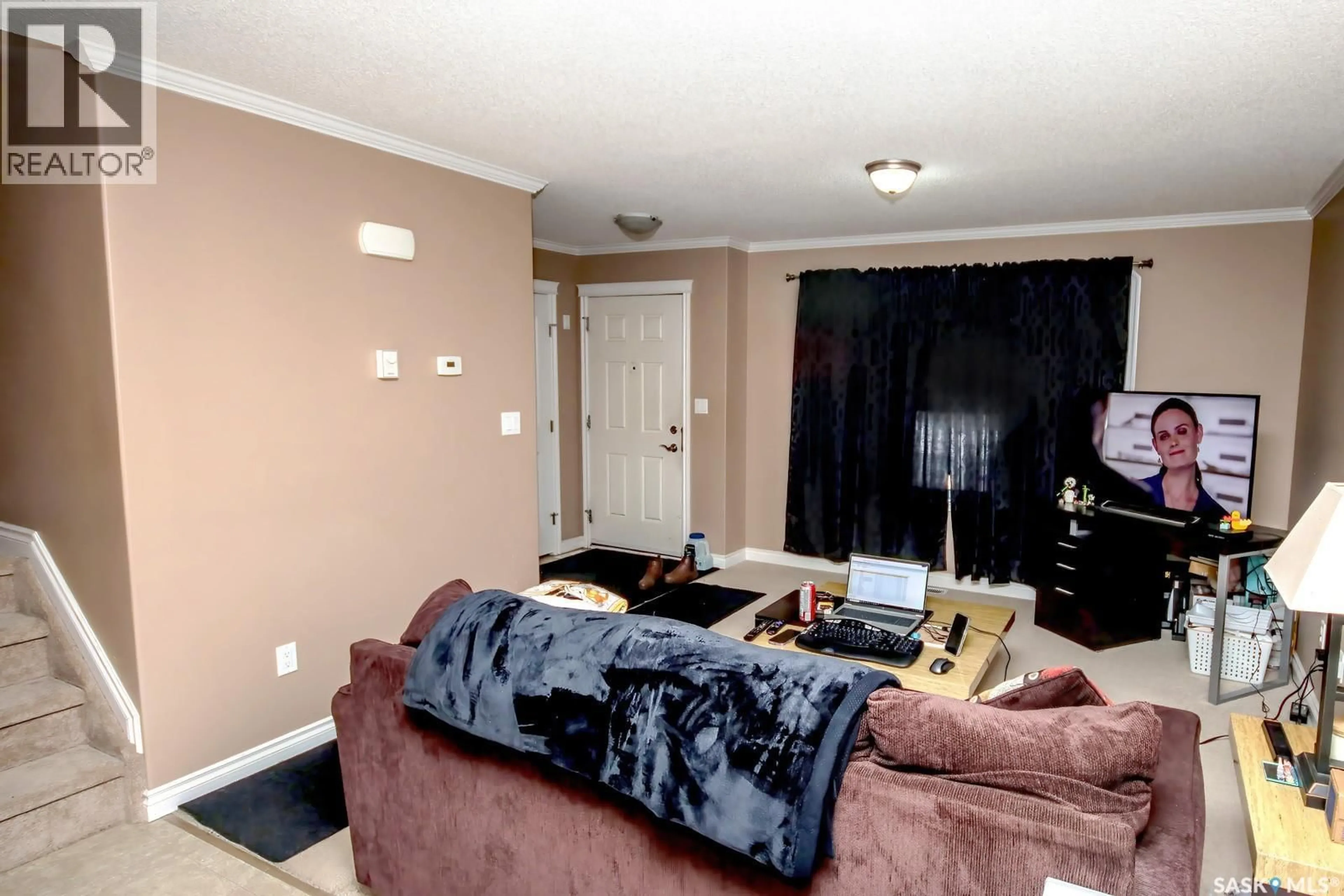 Living room with furniture, unknown for 1805 3RD STREET, Estevan Saskatchewan S4A0T1