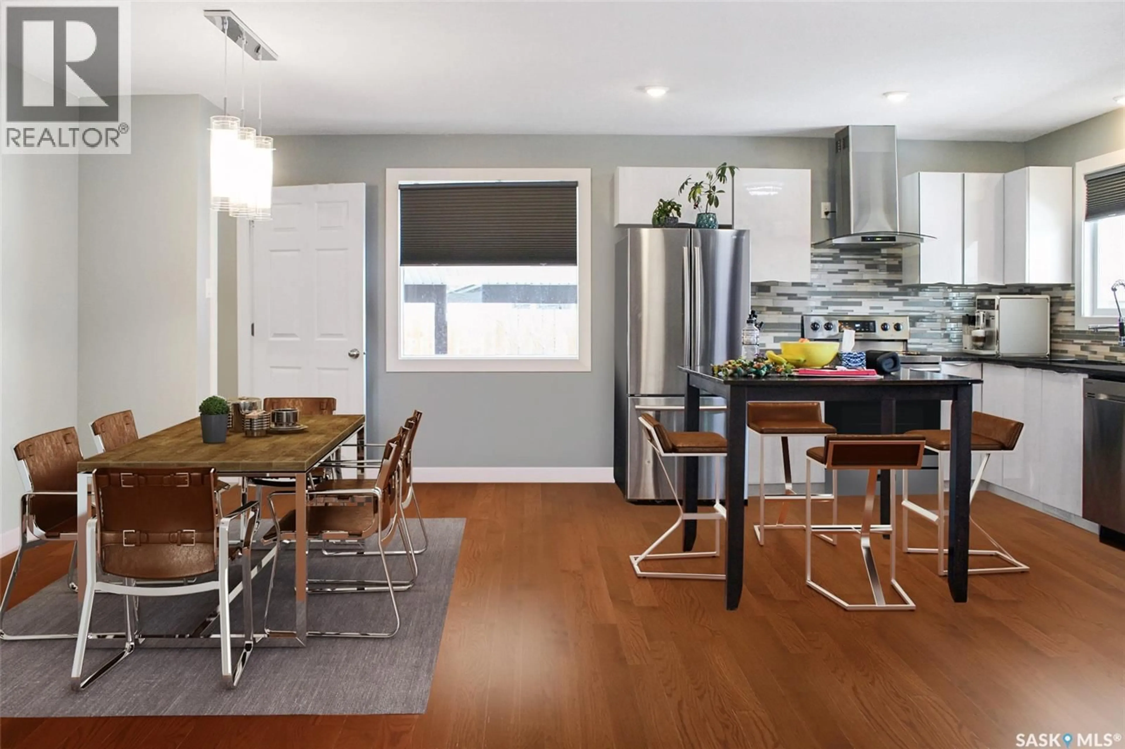 Open concept kitchen, wood/laminate floor for 210 CLINTON PLACE, Swift Current Saskatchewan S9H4K2