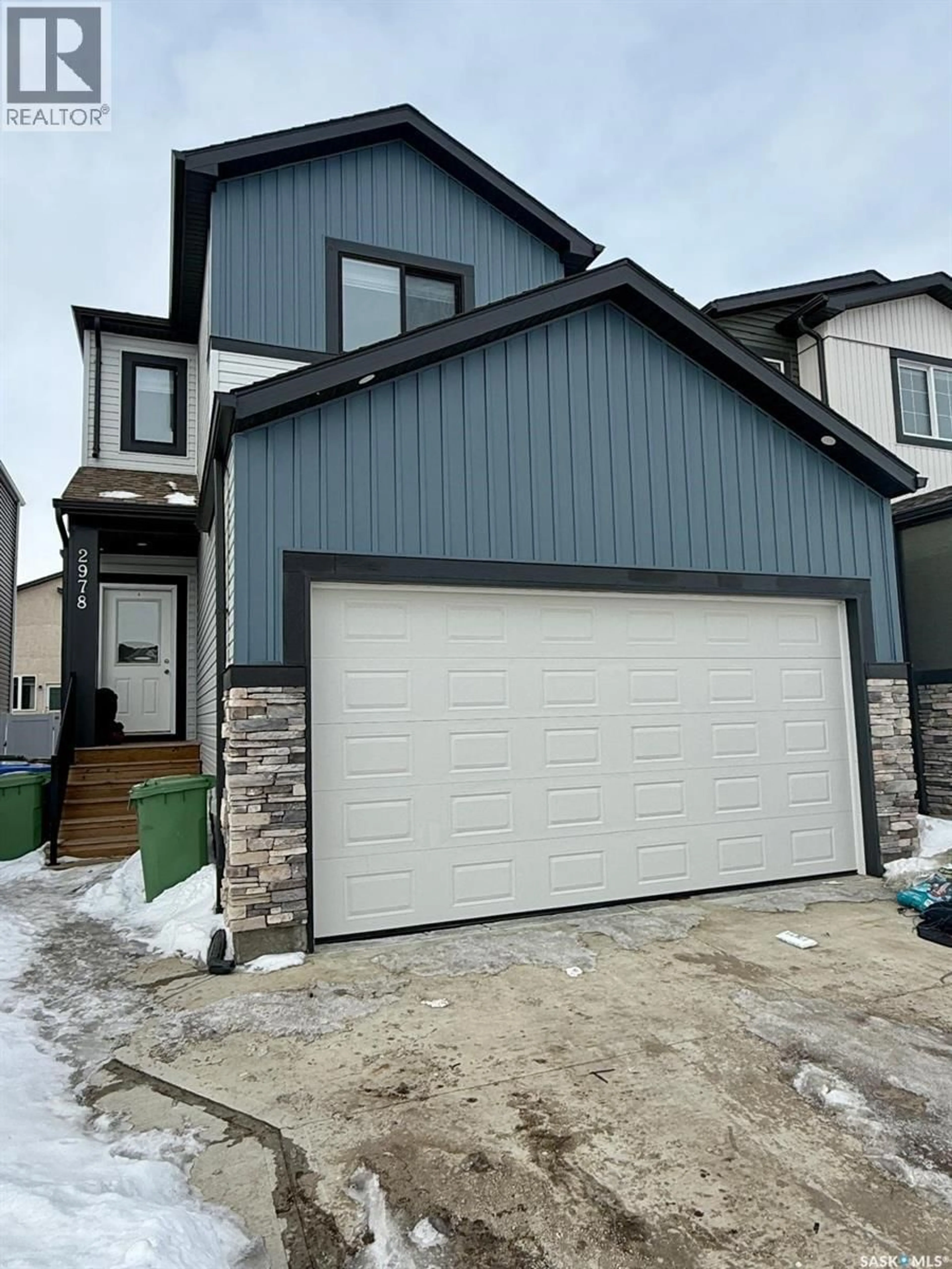 Home with vinyl exterior material, street for 2978 GREEN BROOK ROAD, Regina Saskatchewan S4V3Z6