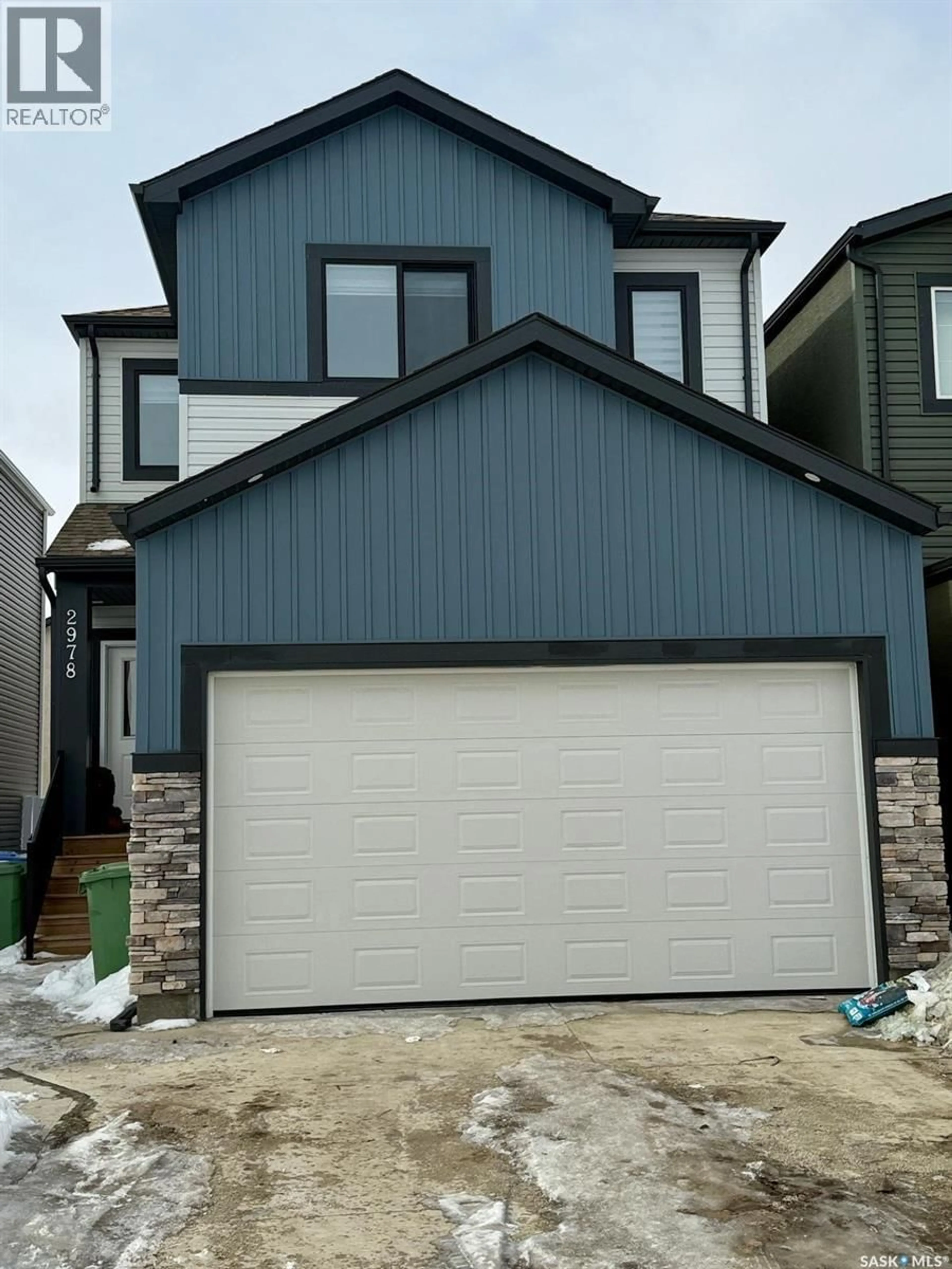 Home with vinyl exterior material, street for 2978 GREEN BROOK ROAD, Regina Saskatchewan S4V3Z6