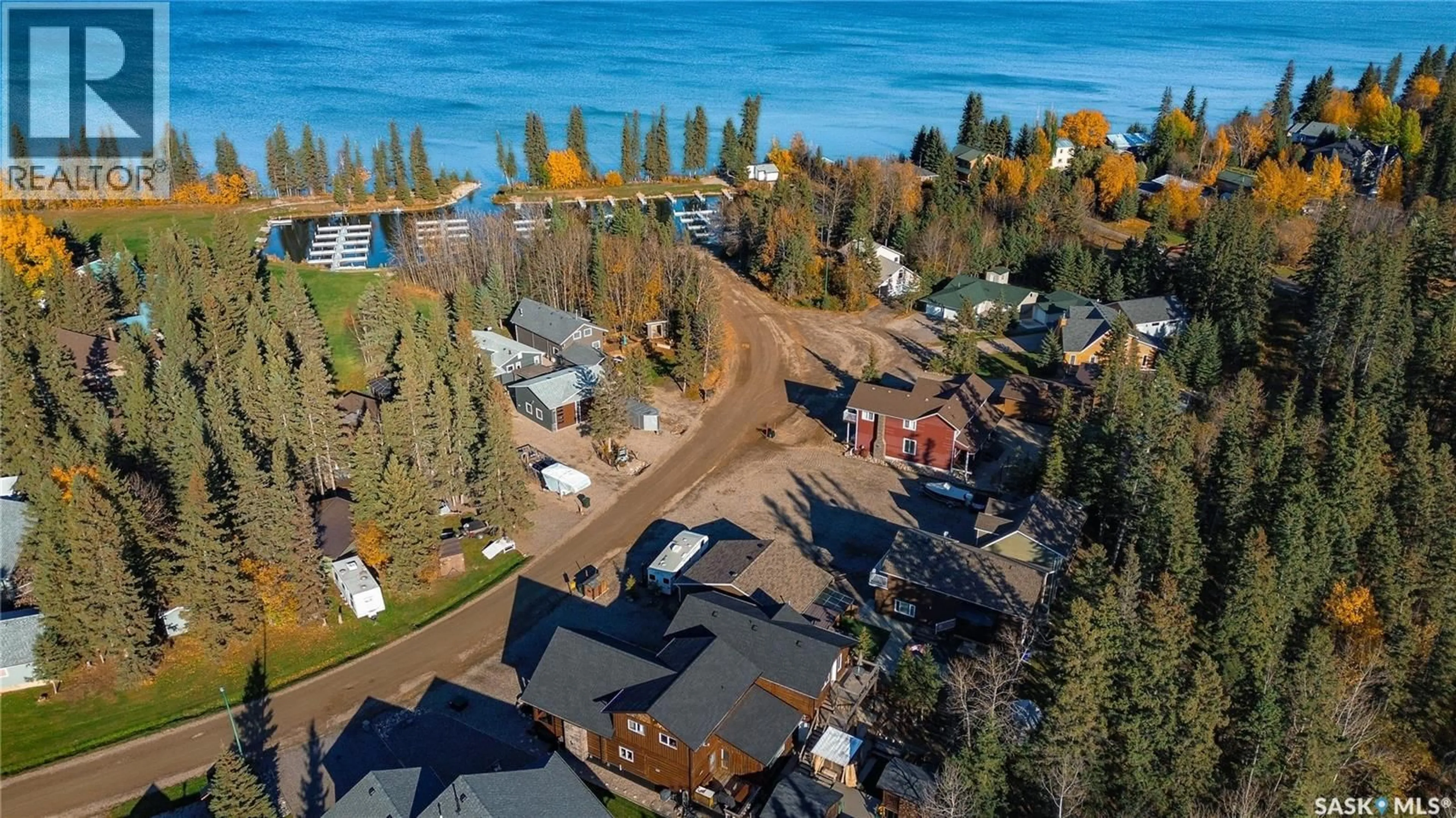 A pic from outside/outdoor area/front of a property/back of a property/a pic from drone, unknown for 16 NIPEW PLACE, Candle Lake Saskatchewan S0J3E0