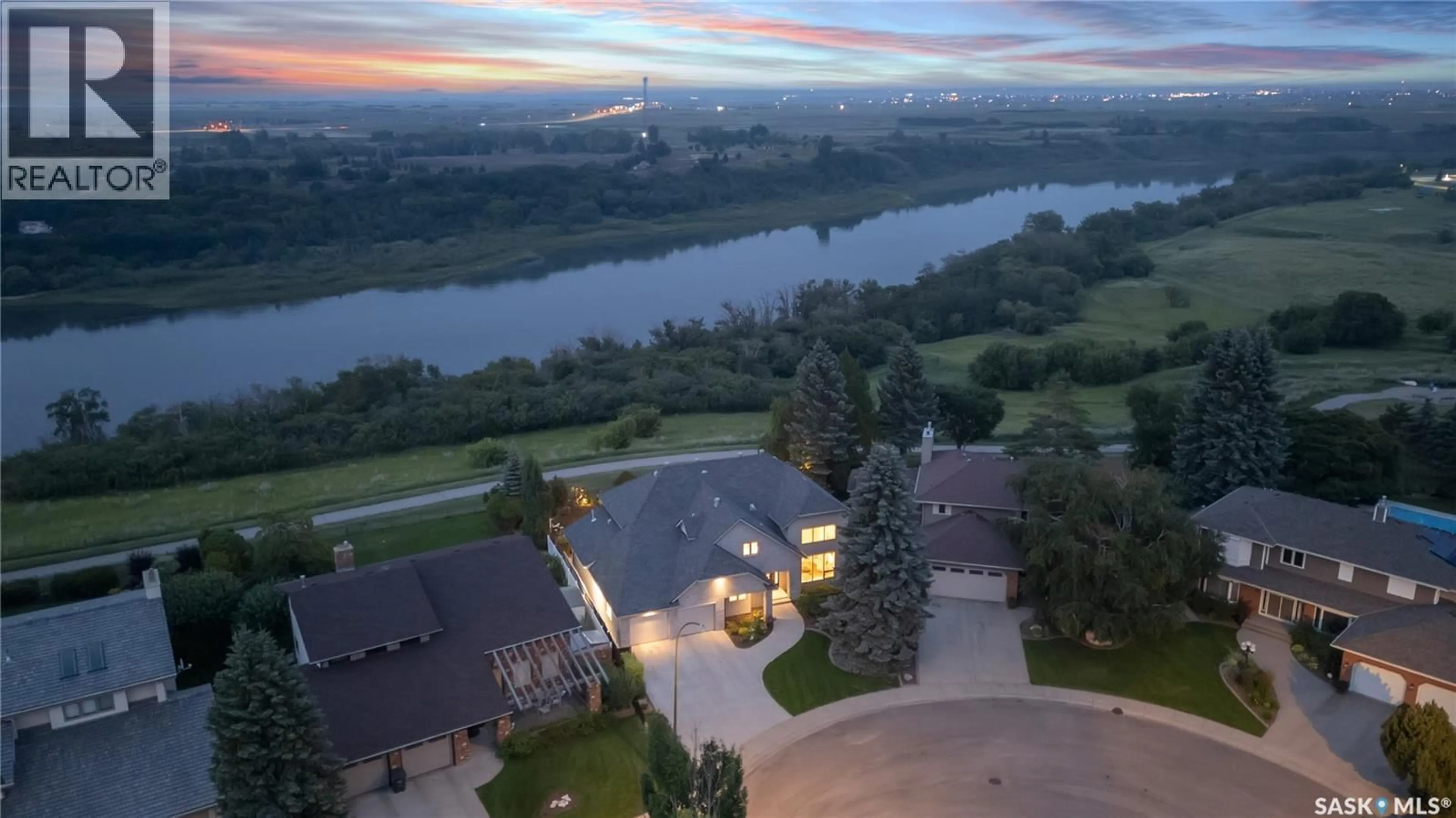 A pic from outside/outdoor area/front of a property/back of a property/a pic from drone, water/lake/river/ocean view for 323 MALLIN CRESCENT, Saskatoon Saskatchewan S7K7X2