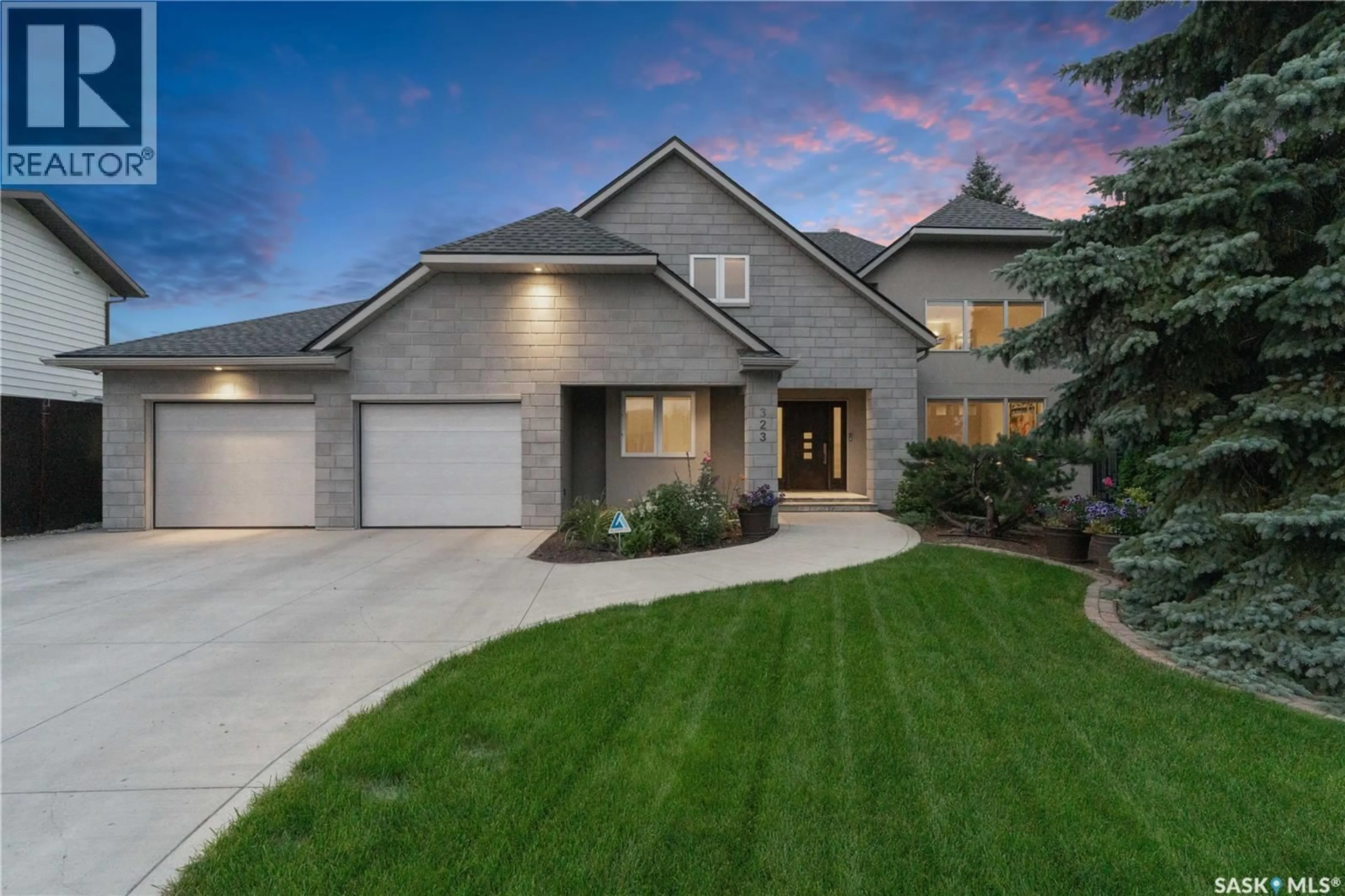 Home with brick exterior material, street for 323 MALLIN CRESCENT, Saskatoon Saskatchewan S7K7X2